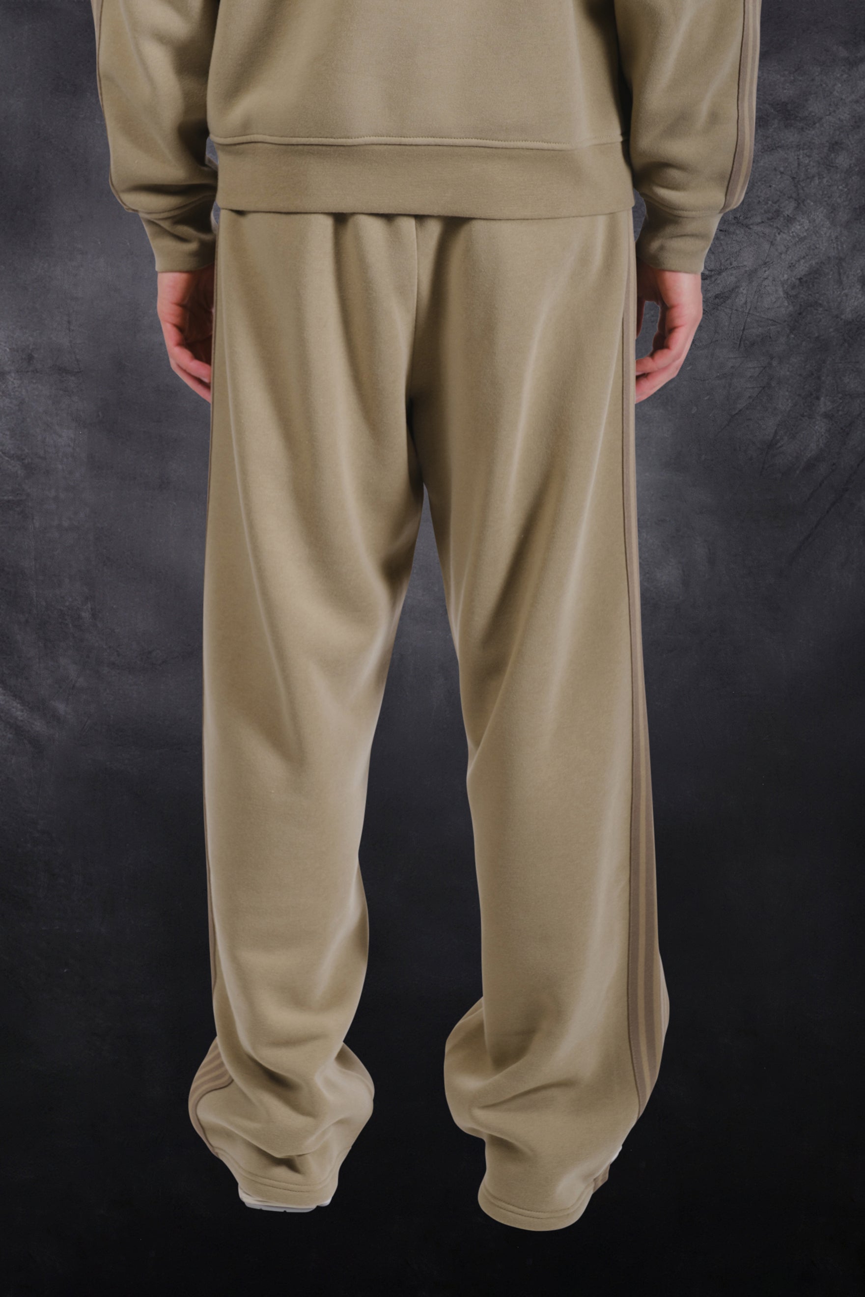 Men's cozy fleece track pant with a loose fit and drawstring waist for comfort
#color_olive green