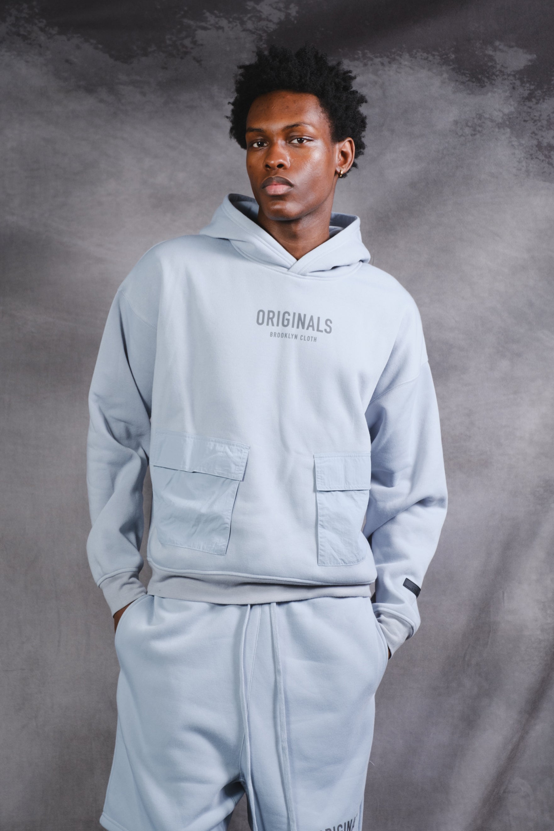 Originals Nylon Cargo Pocket Hoodie. #color_quarry