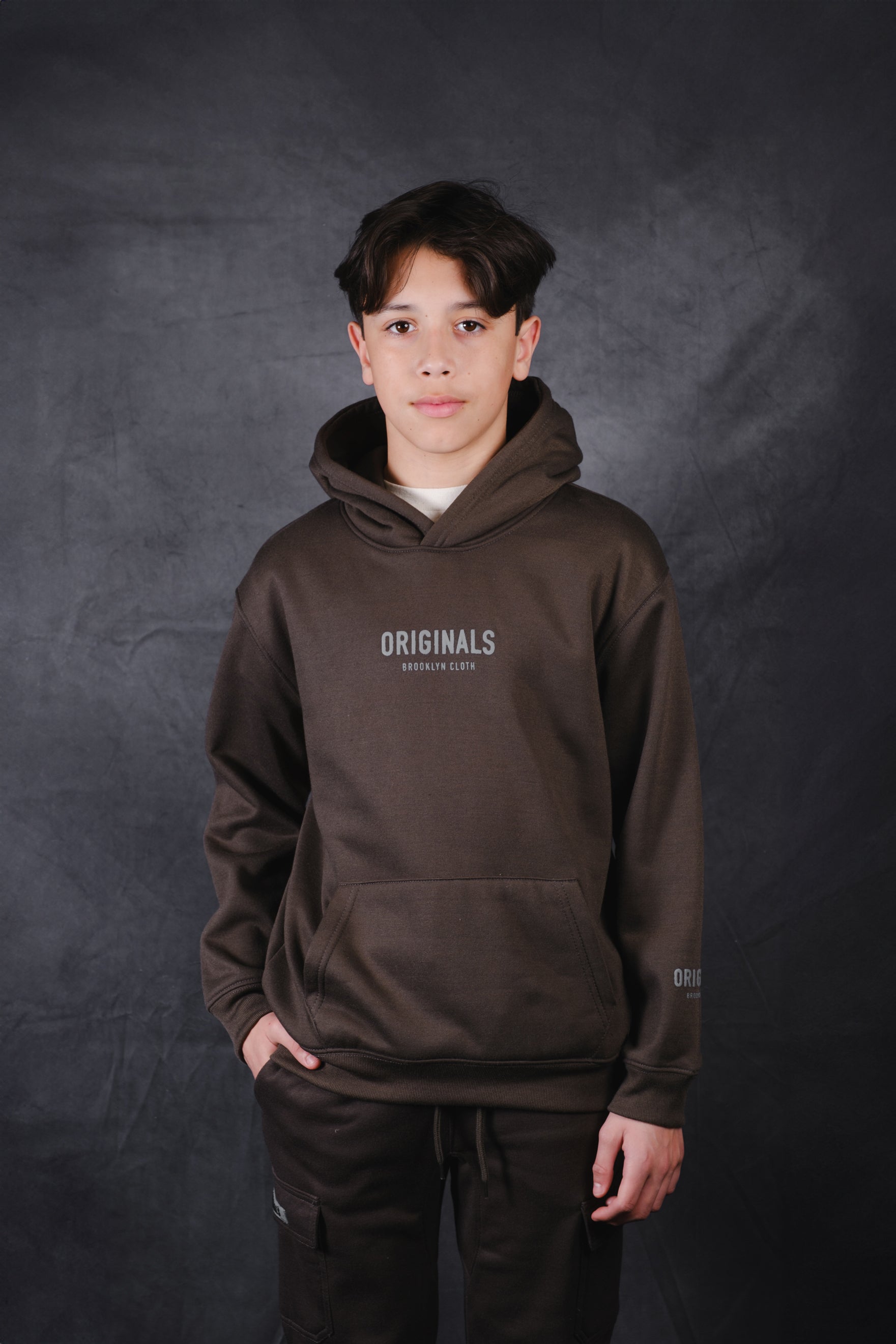 Kids Originals pullover hoodie with chest logo
#color_dusty black