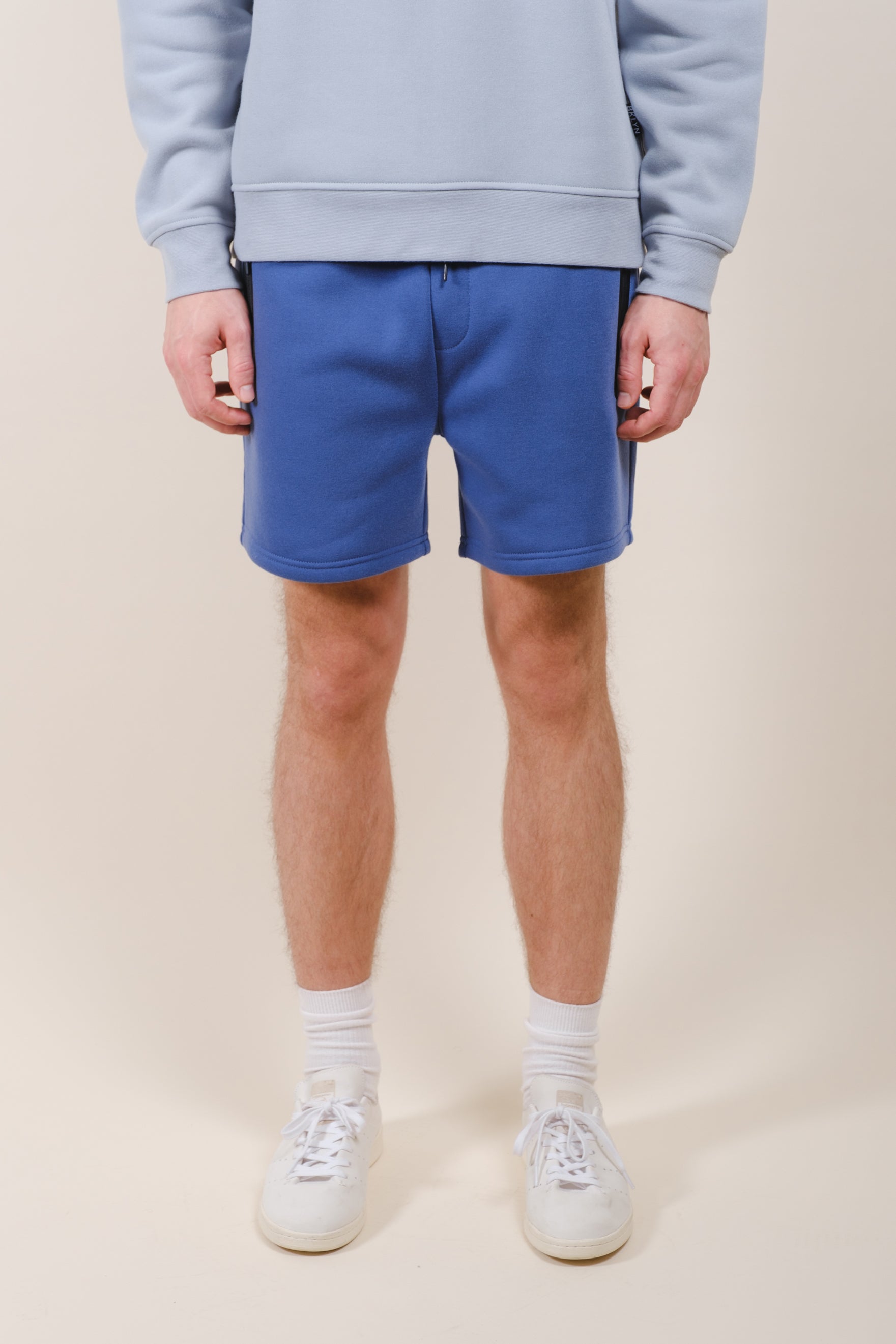 Durable men's 5 inch inseam shorts with stylish heat seal detail
#color_cobalt blue