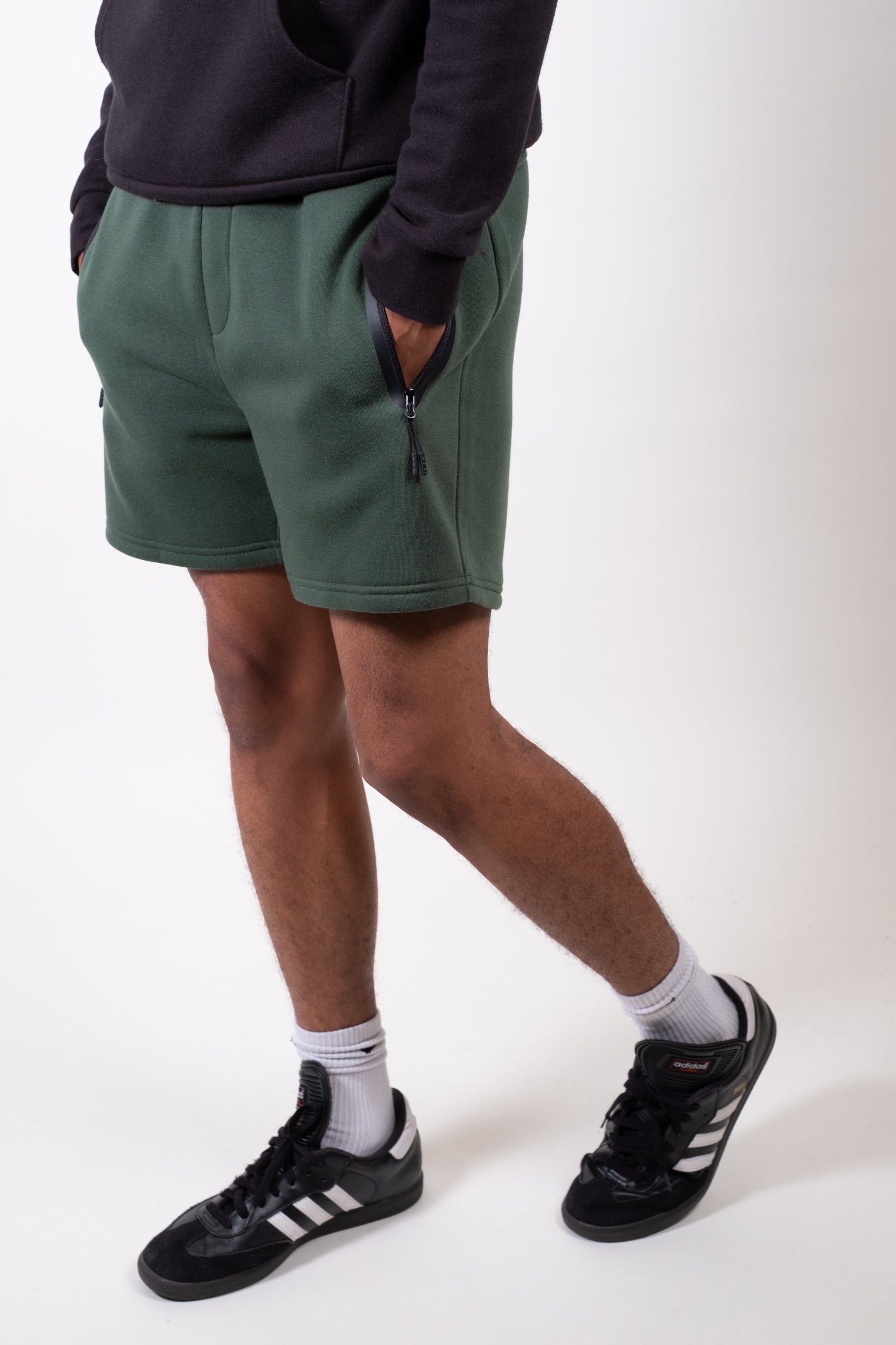 Comfortable men's 5 inch inseam shorts with minimalist branding
#color_hunter green