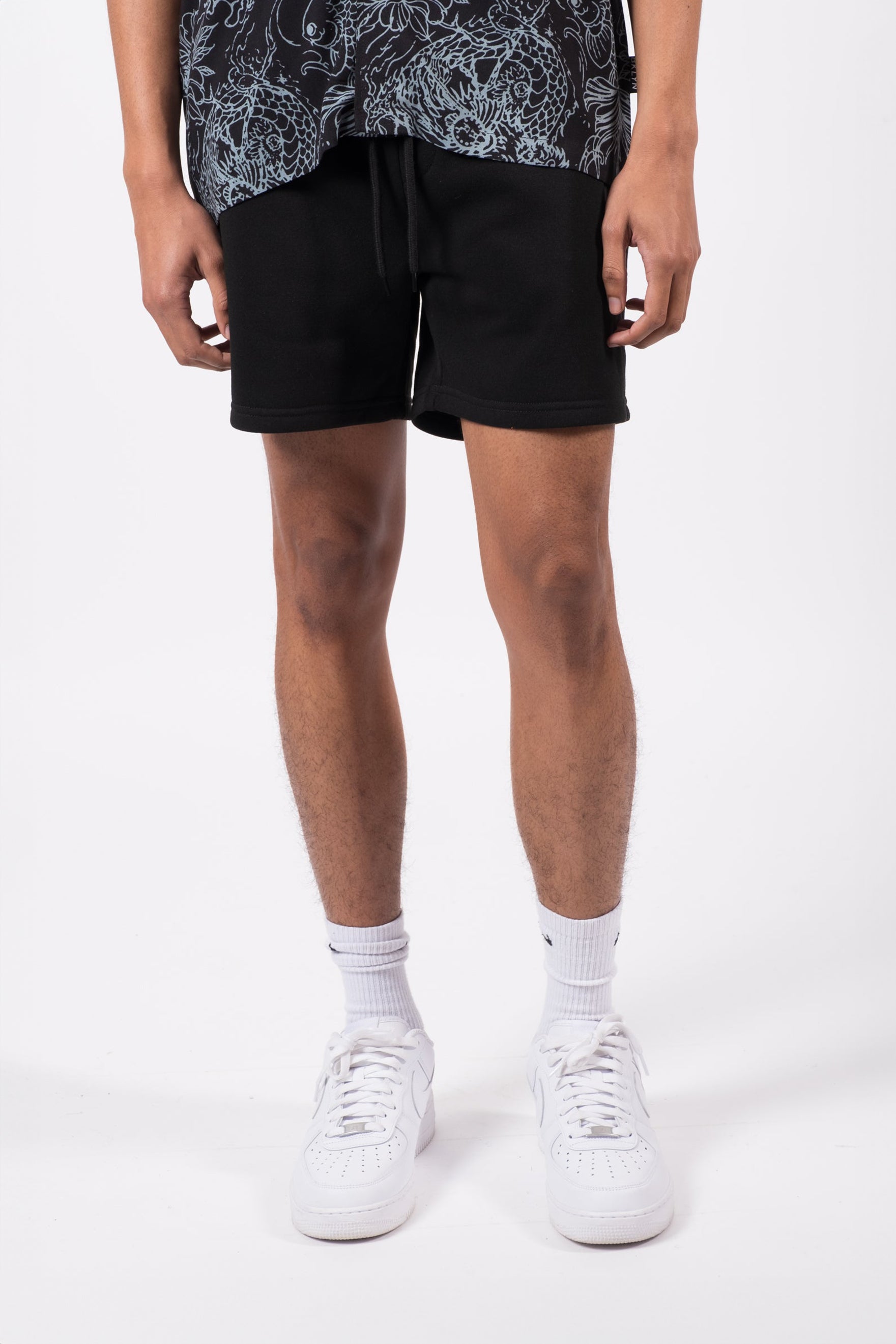 Men's 5 inch inseam Heat Seal Zip Pocket Short in black
#color_black