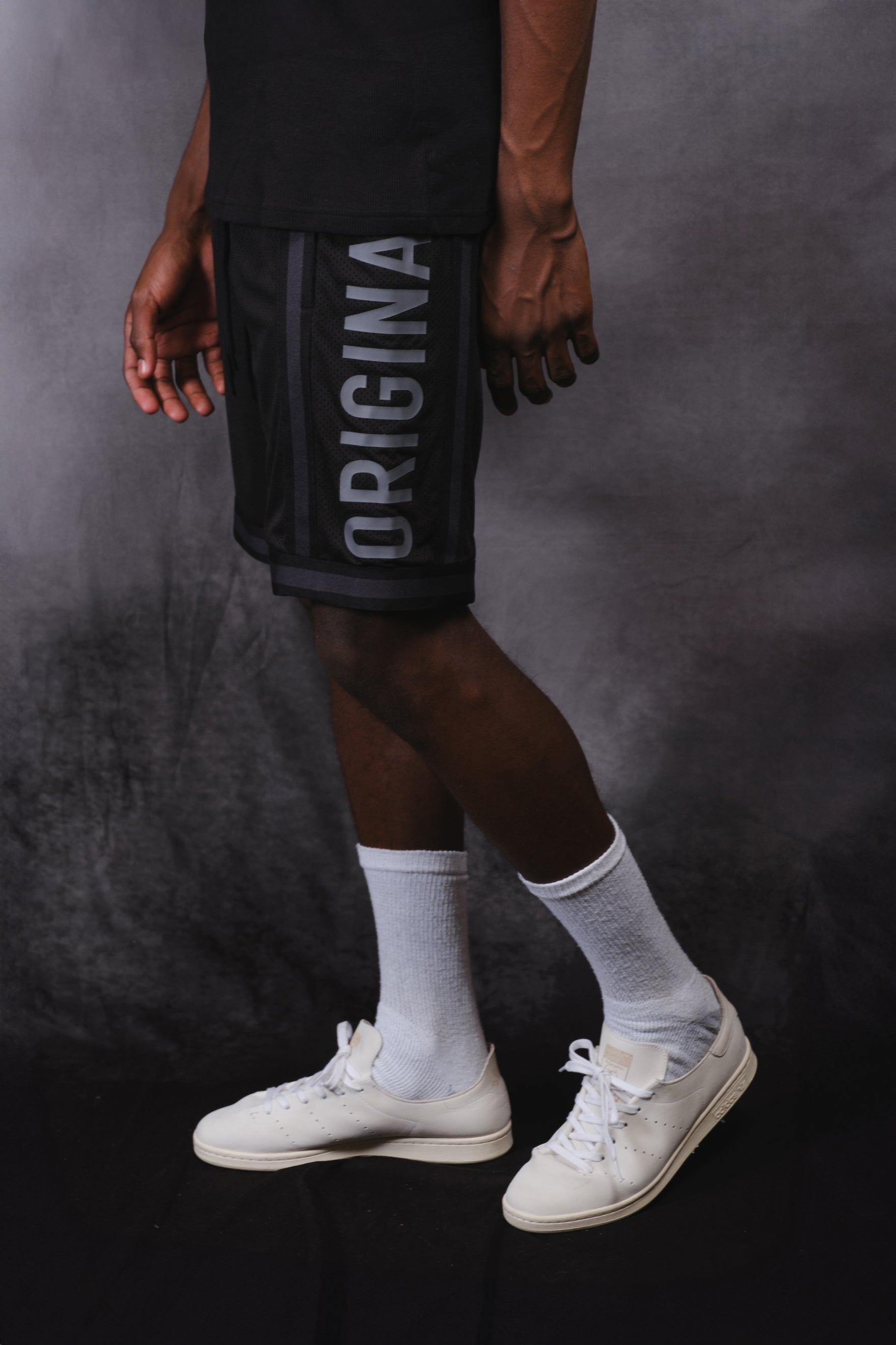 Paneled Originals Basketball Shorts with elastic waistband for secure fit
#color_black