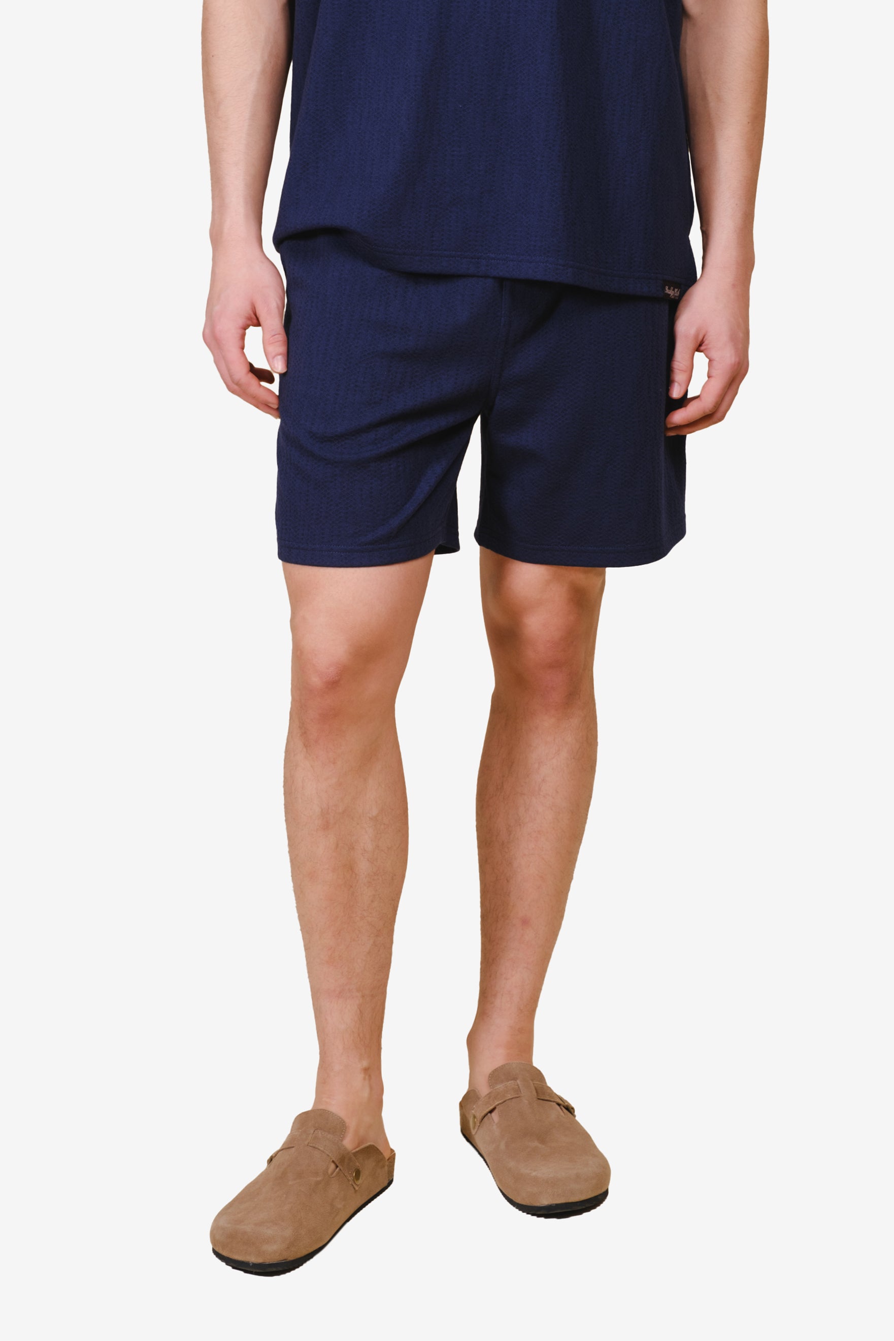 Men's navy vertical cross knit short with 5-inch seam #color_french-navy