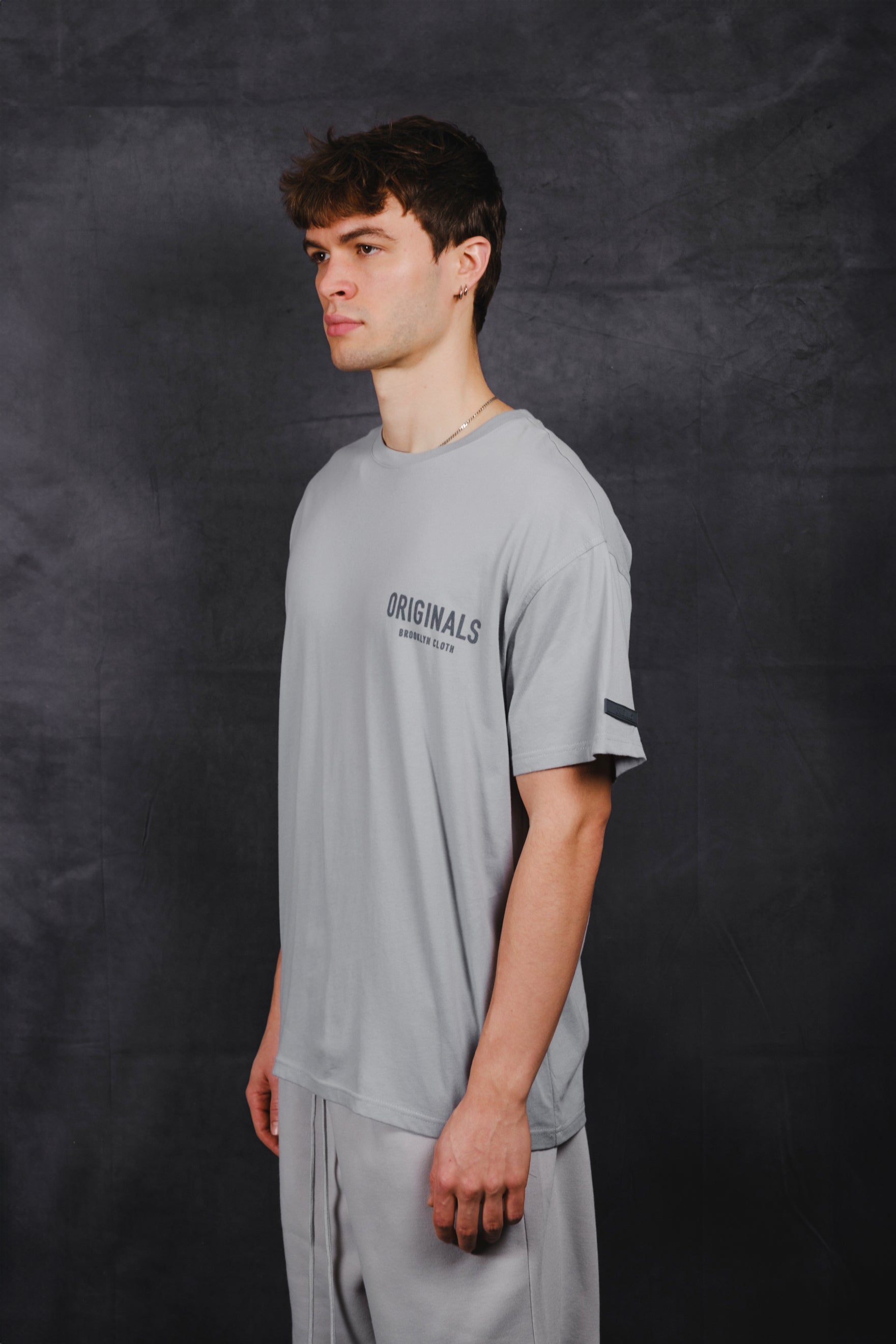 Classic fit Originals Front Flock Tee with unique flock print design
#color_quarry