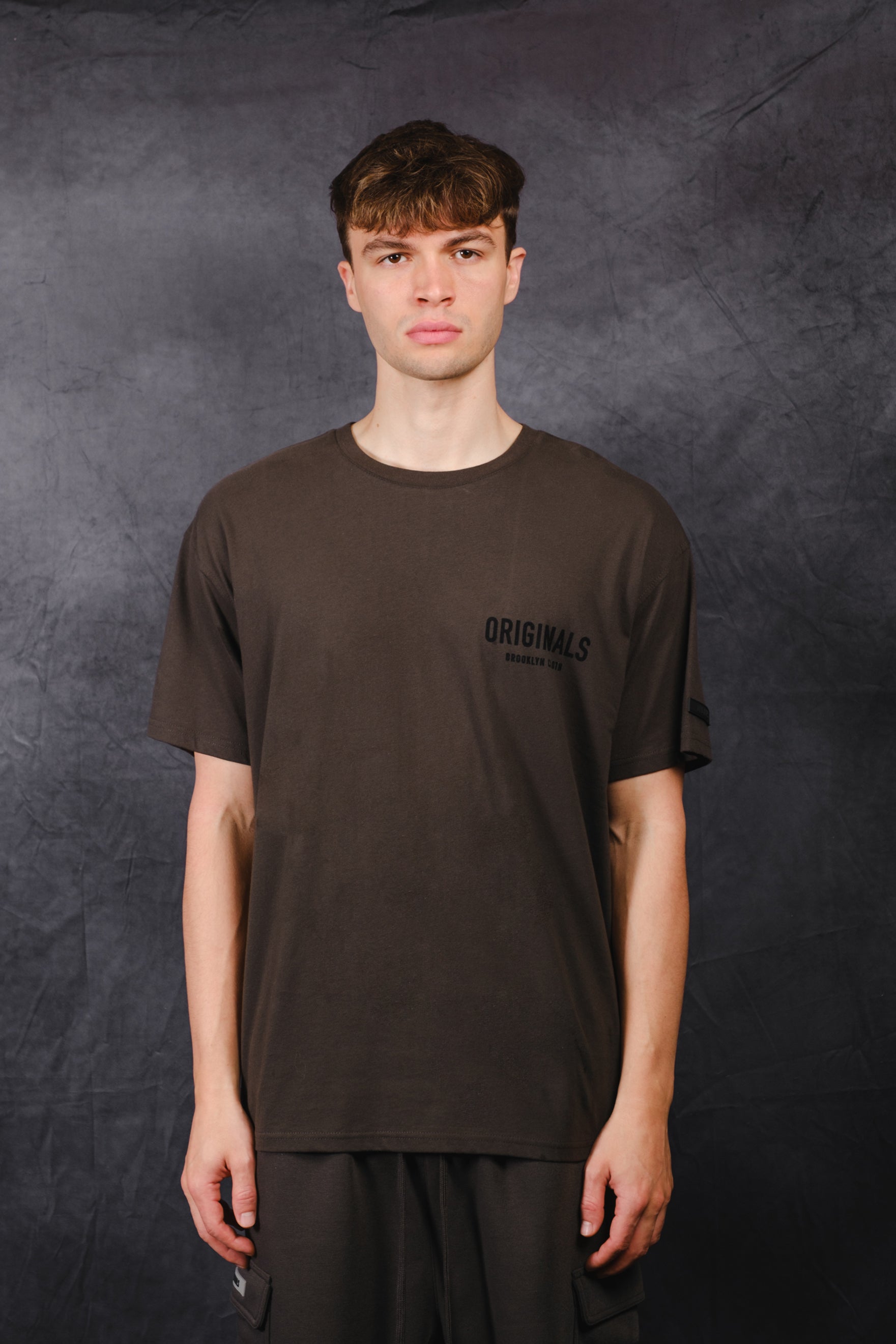 Originals Front Flock Tee, soft cotton blend with flocked chest detail
#color_dusty-black