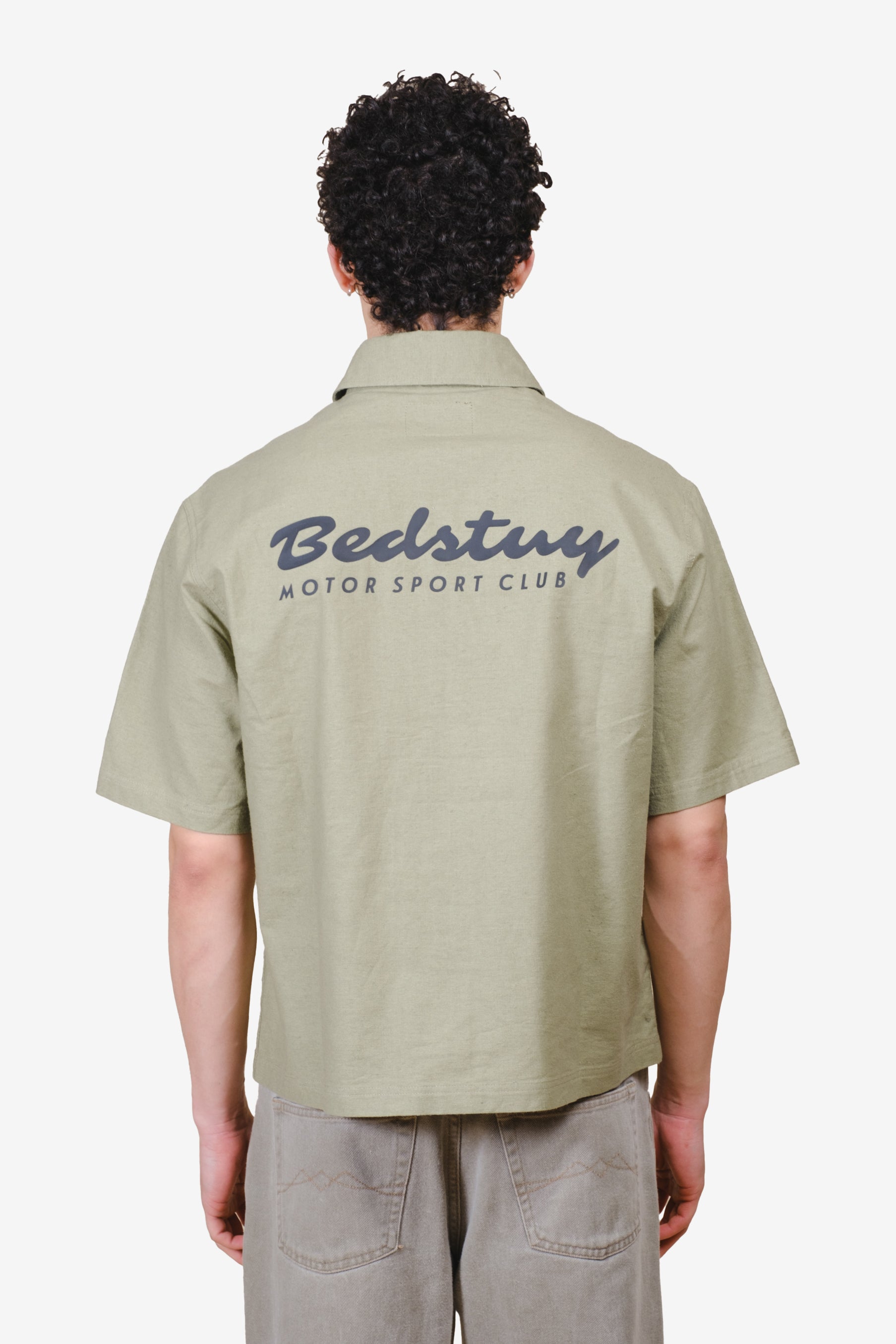 Men's short sleeve cropped button up shirt with writing detail on back
#color_olive gray