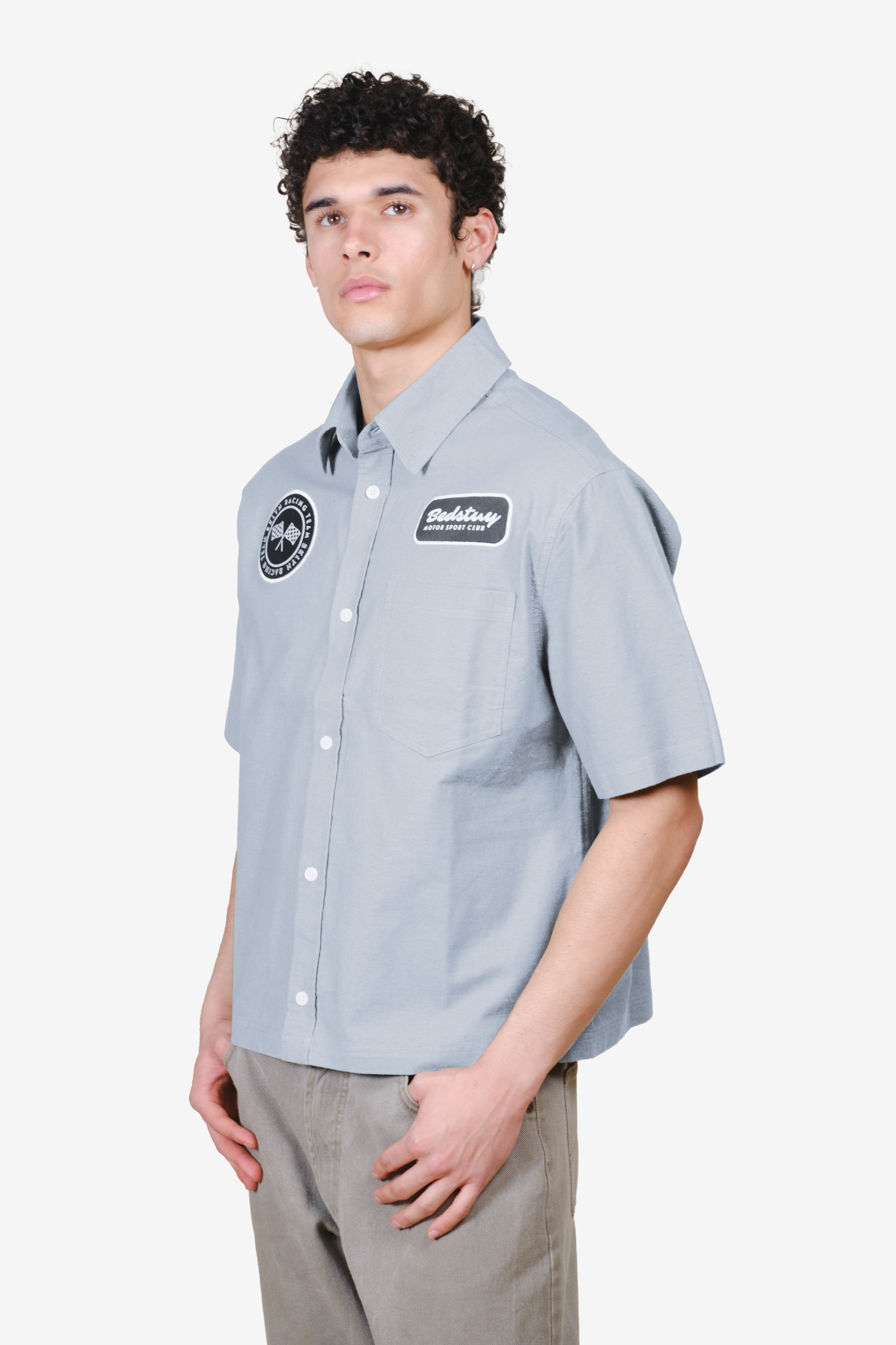 Cropped, boxy fit men's button up top with patch detailing in Quarry color #color_quarry