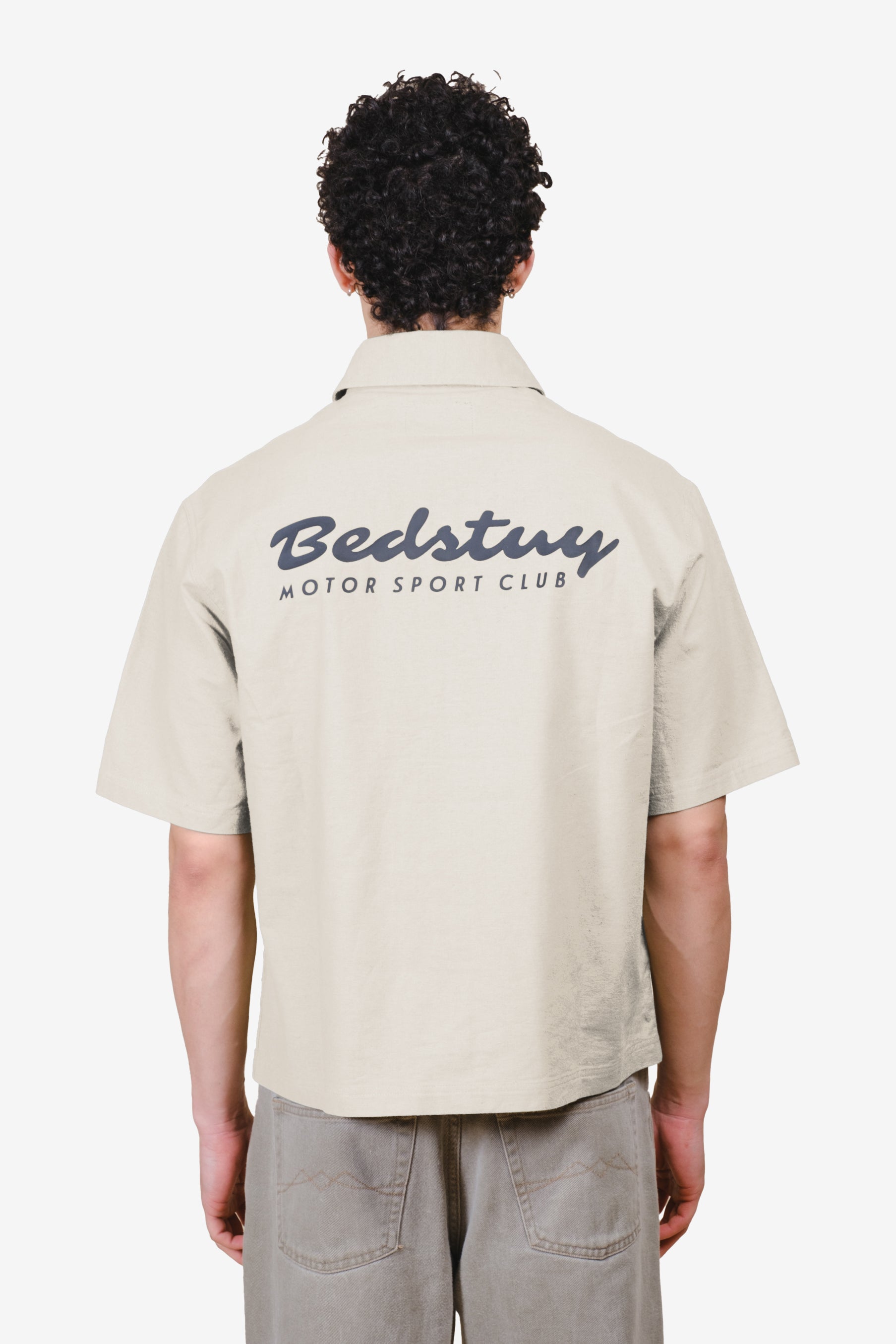 Short sleeve mens' cropped button up shirt with Bedstuy motorsport club design #color_sand