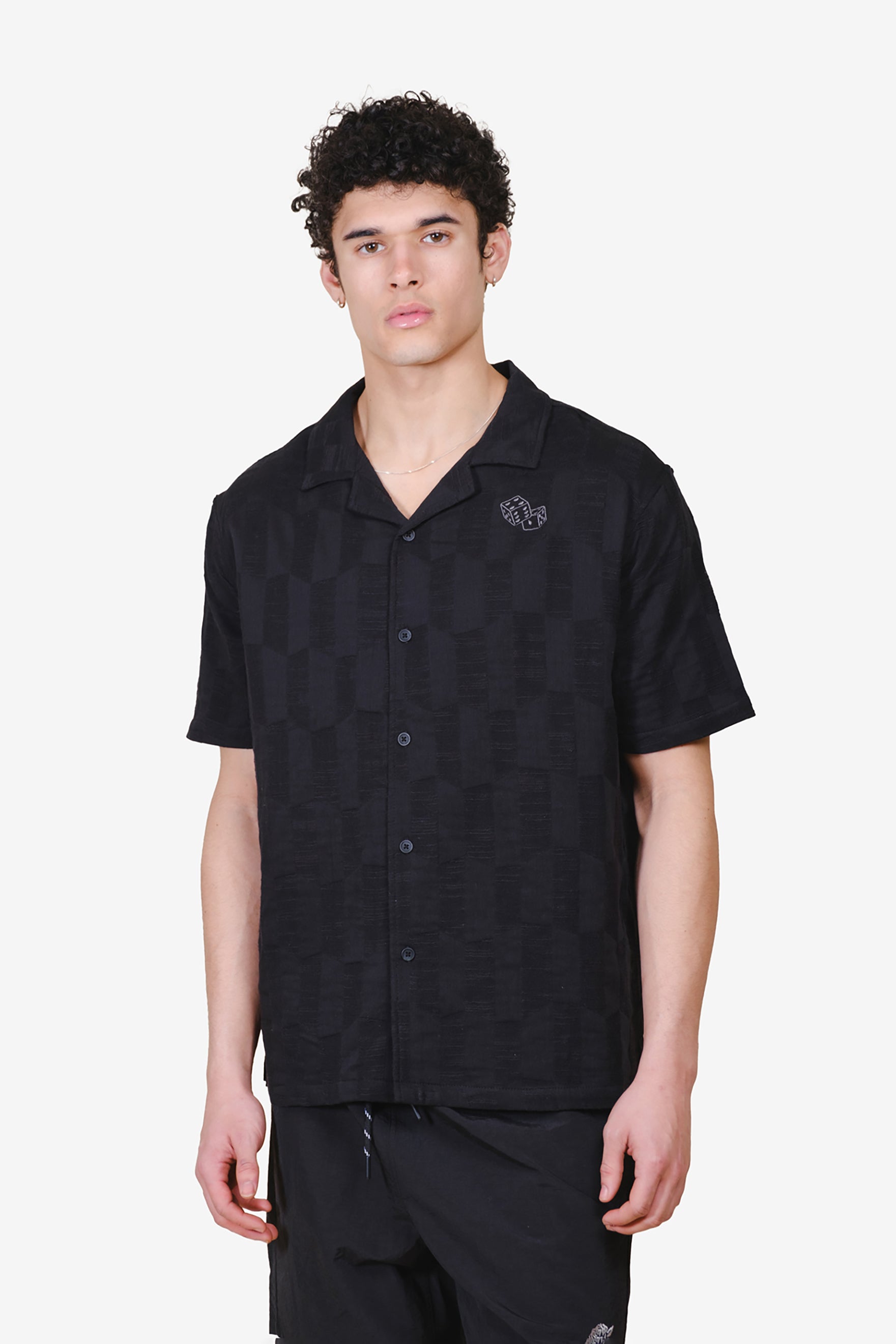 Men's Jacquard woven button down shirt with checkered pattern and dice detail #color_black