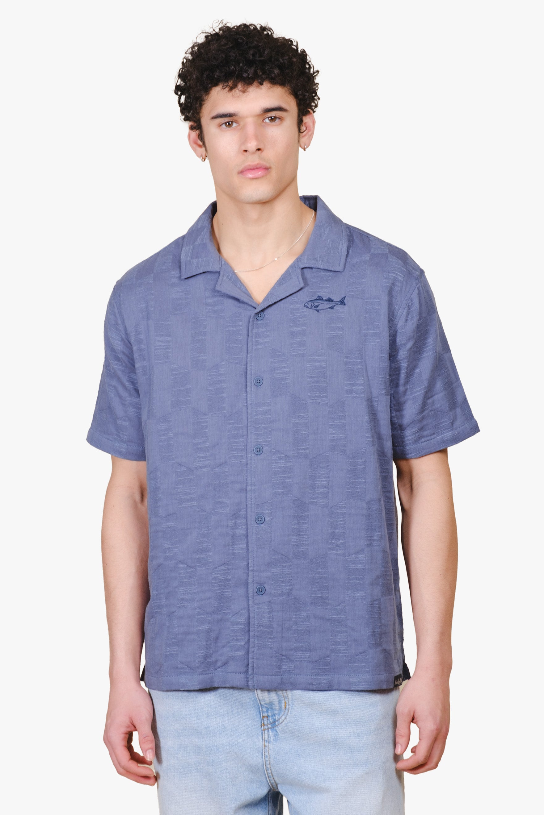 Men jacquard woven shirt with checkered detail and fish embroidery on chest
#colorcoastalblue