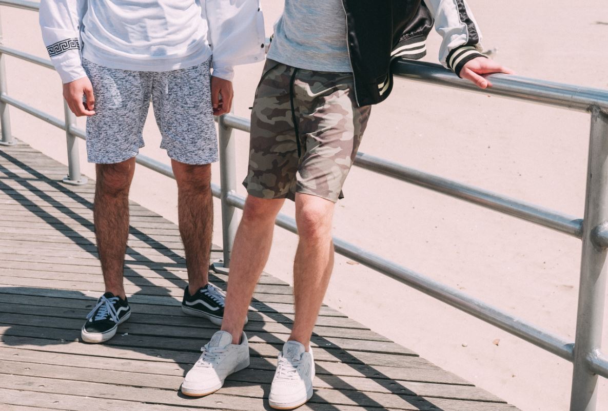 two people wearing jogger shorts