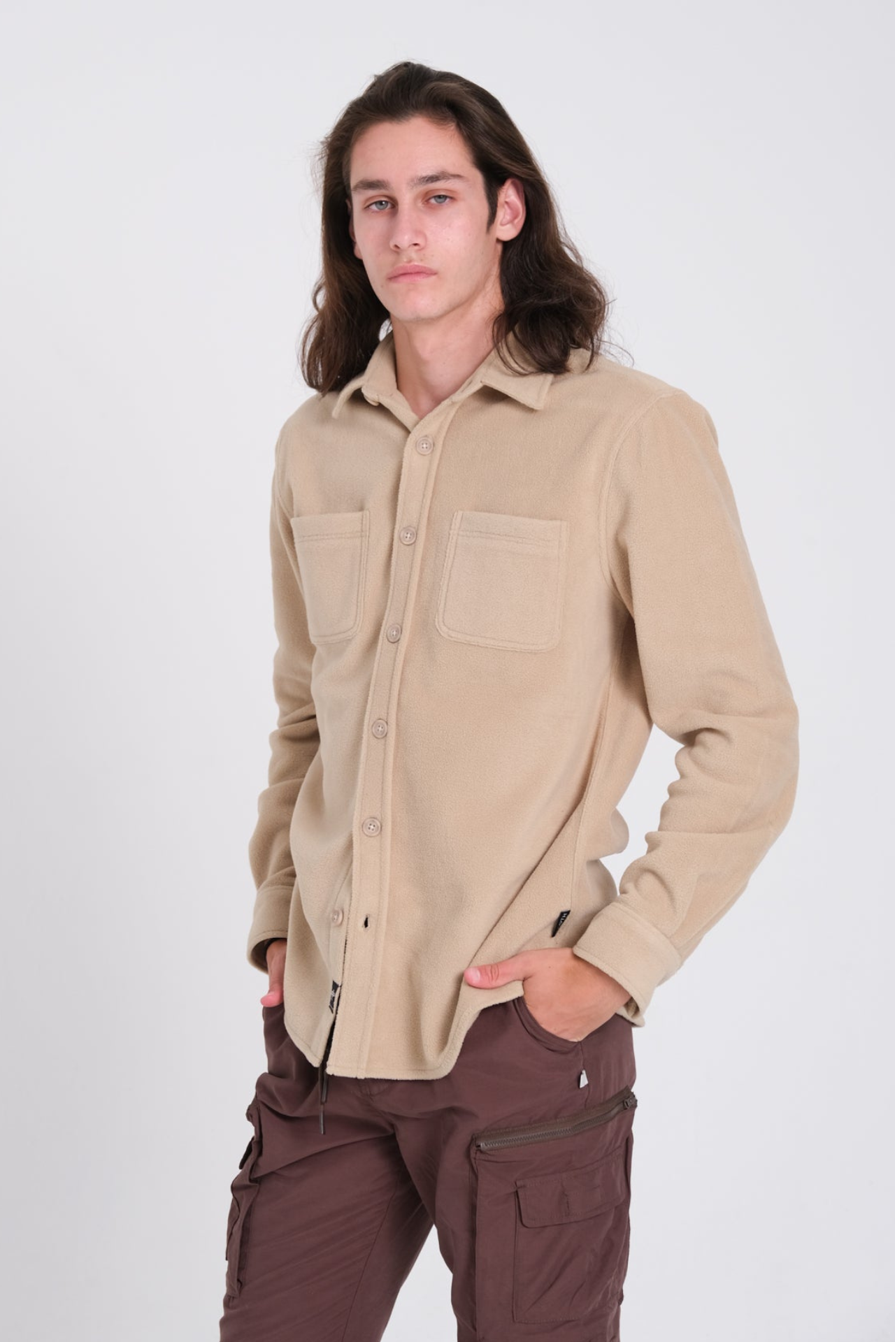 Heavy knit shacket with long sleeves and classic button details.
#color_khaki