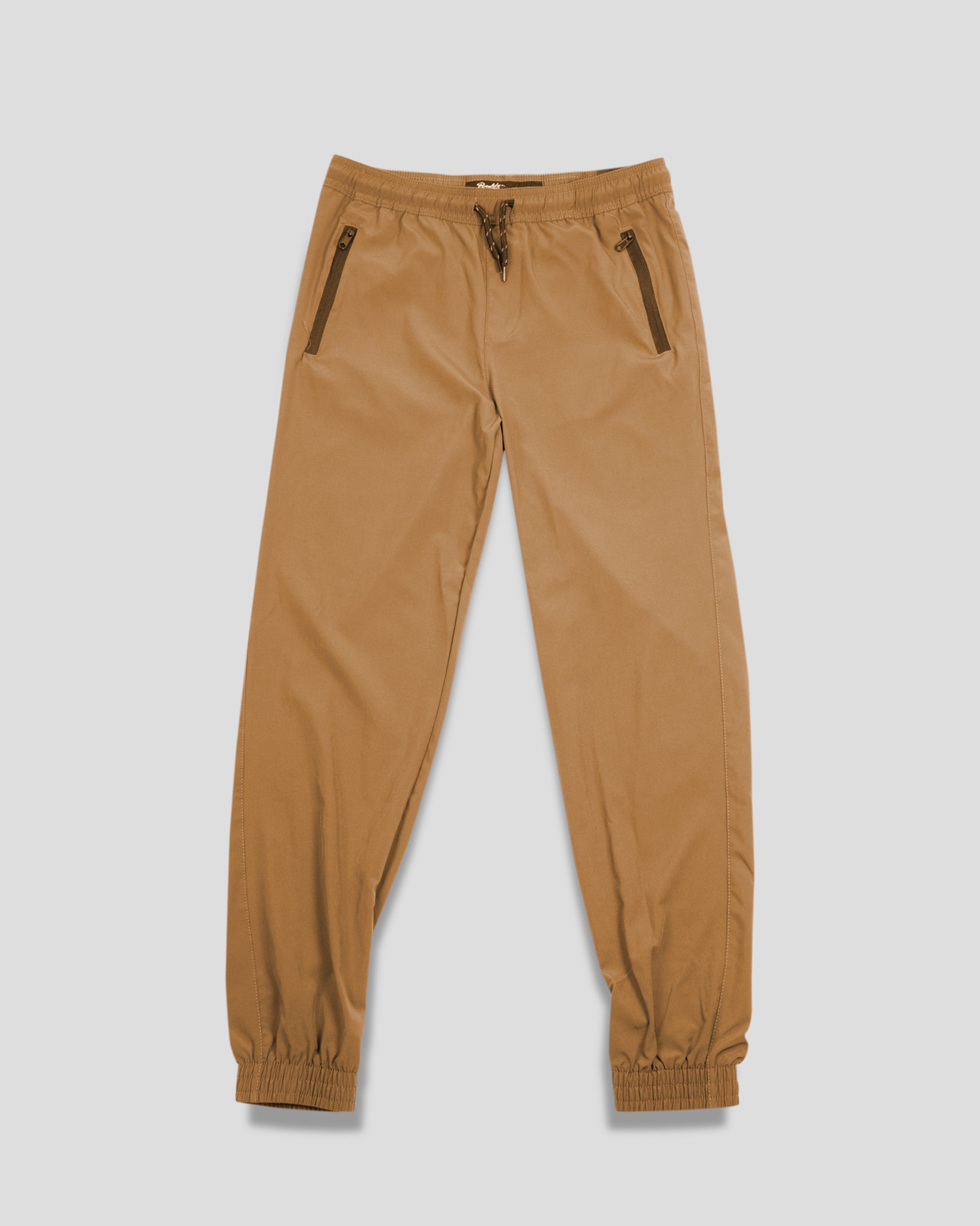 Kids 4-Way Stretch Zip Pocket Jogger
Kids tobacco joggers, 4-way stretch, zip pocket jogger, with drawstring for adjustable waist. #color_camel