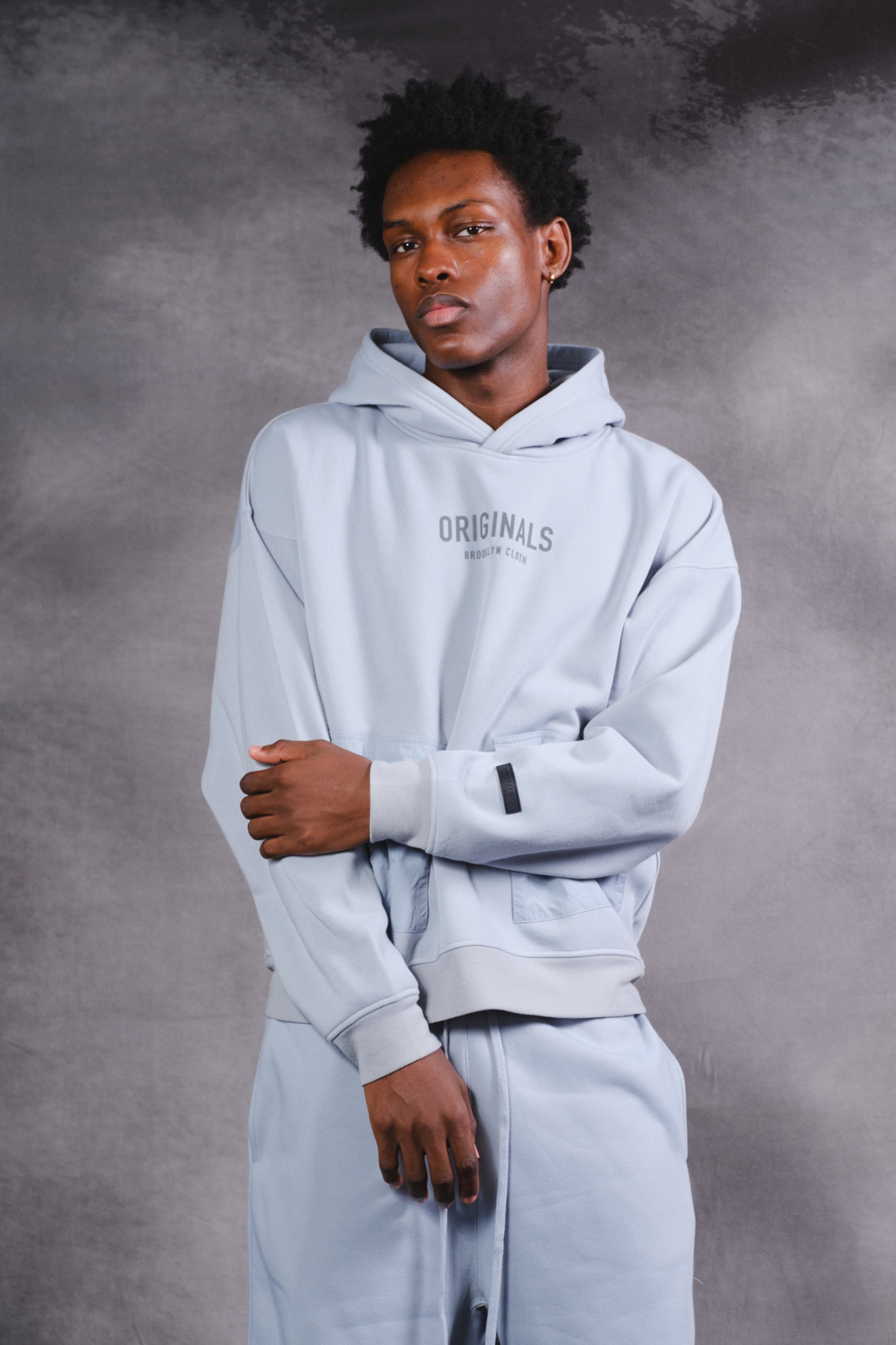 Originals Nylon Cargo Pocket Hoodie. #color_quarry