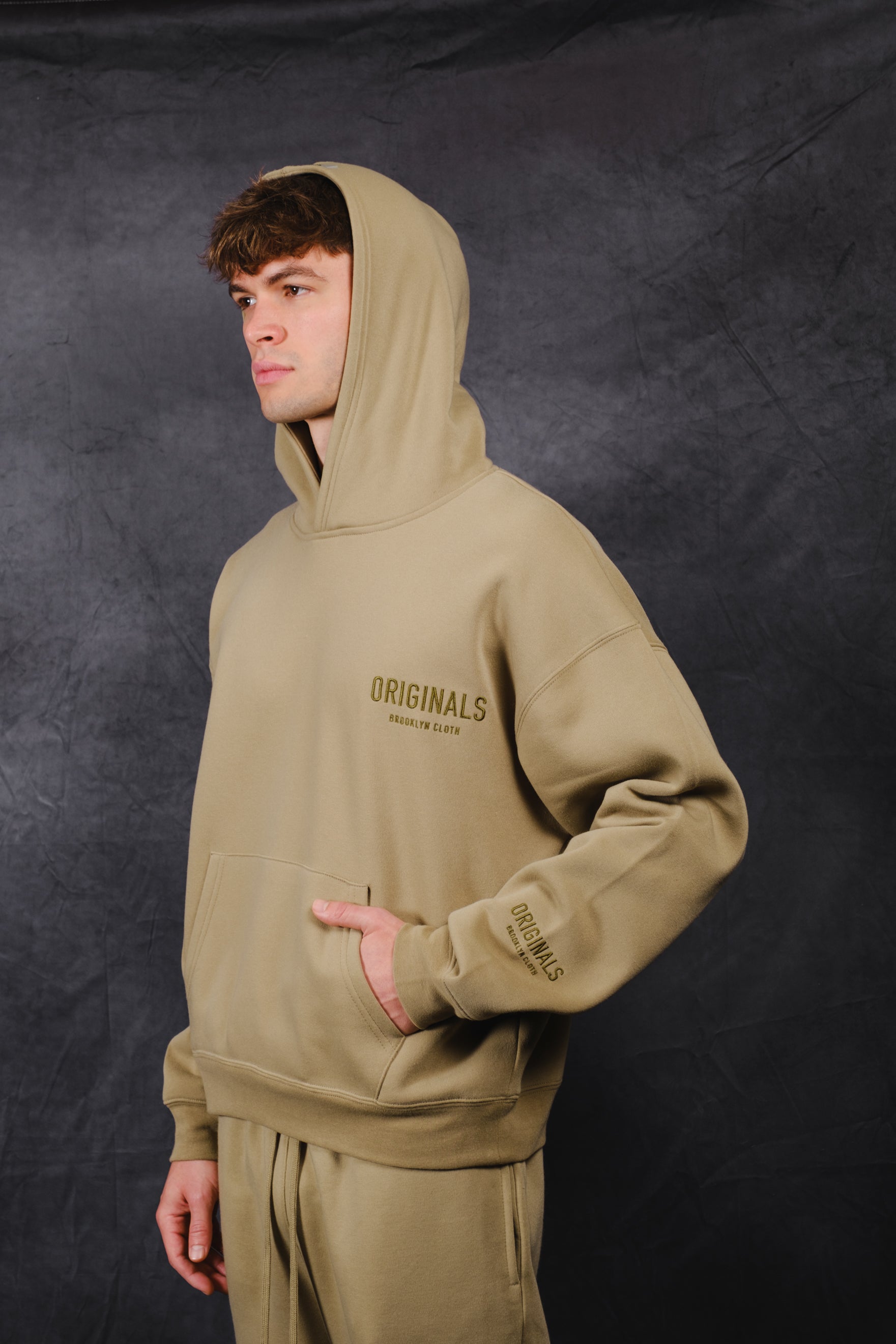 Comfortable, oversized hoodie with tonal embroidery from Brooklyn Cloth. 
.#color_olive gray