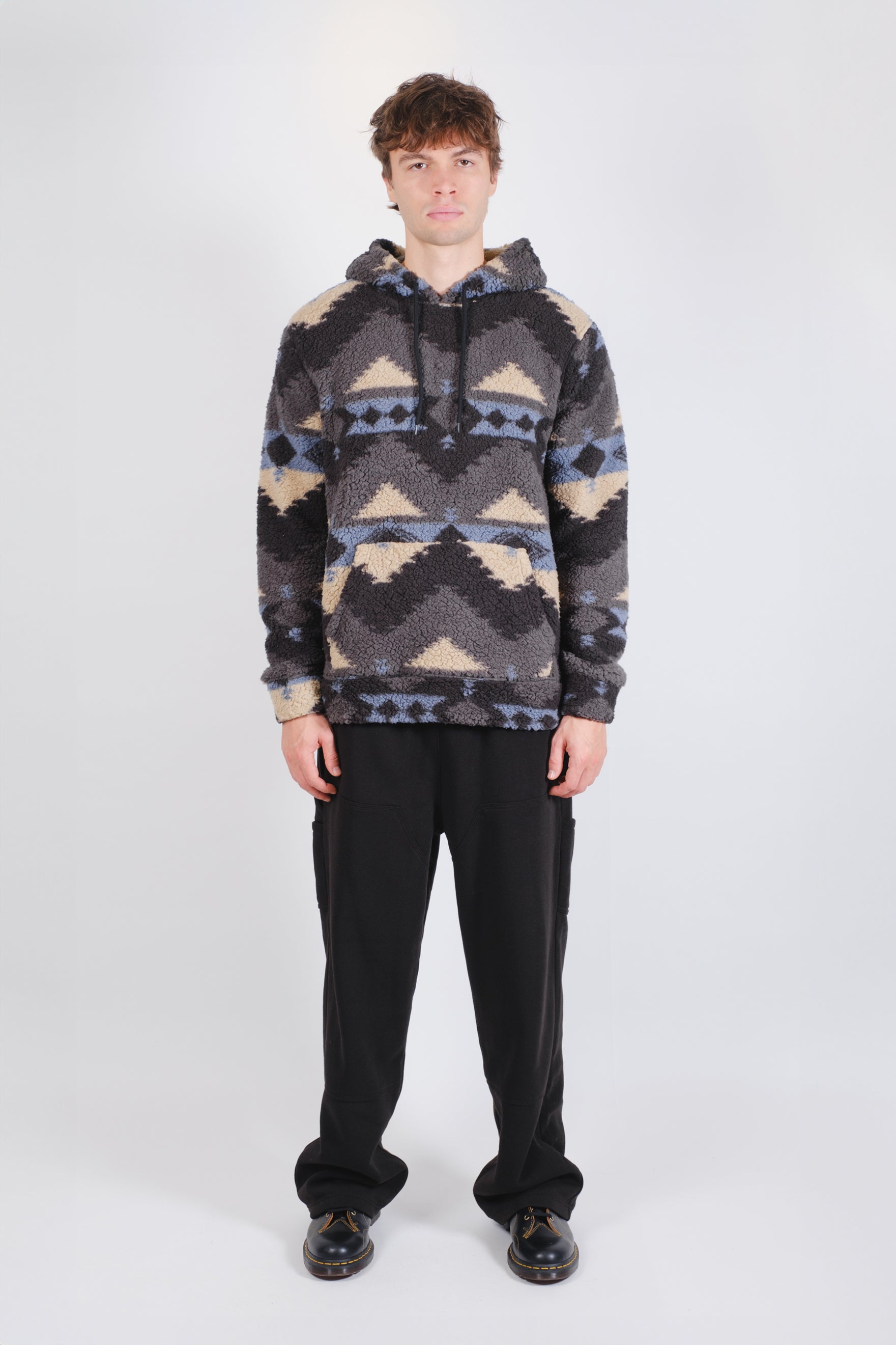 Native Stamp Brooklyn cloth Sherpa Hoodie
Men's smultipcolor native print, black, blue, grey, sand soft sherpa long sleeve hoodie, drawstring hood, and front pocket. #color_black