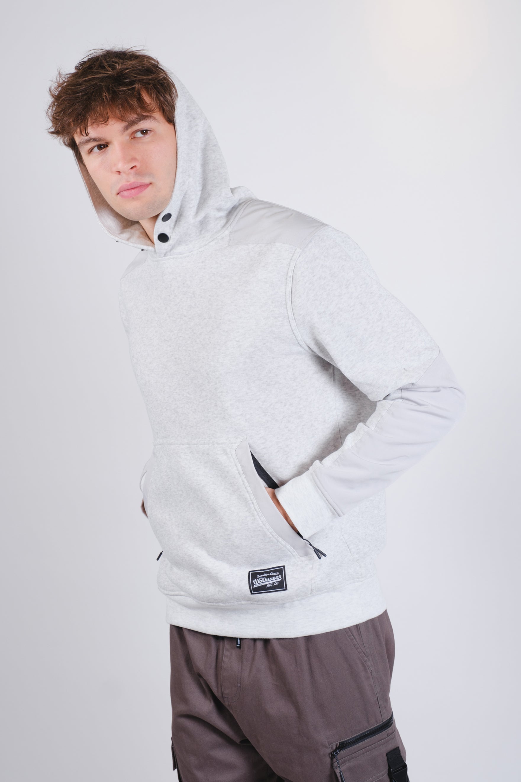 Men's grey fleece hoodie a front pouch pocket. #color_heather grey