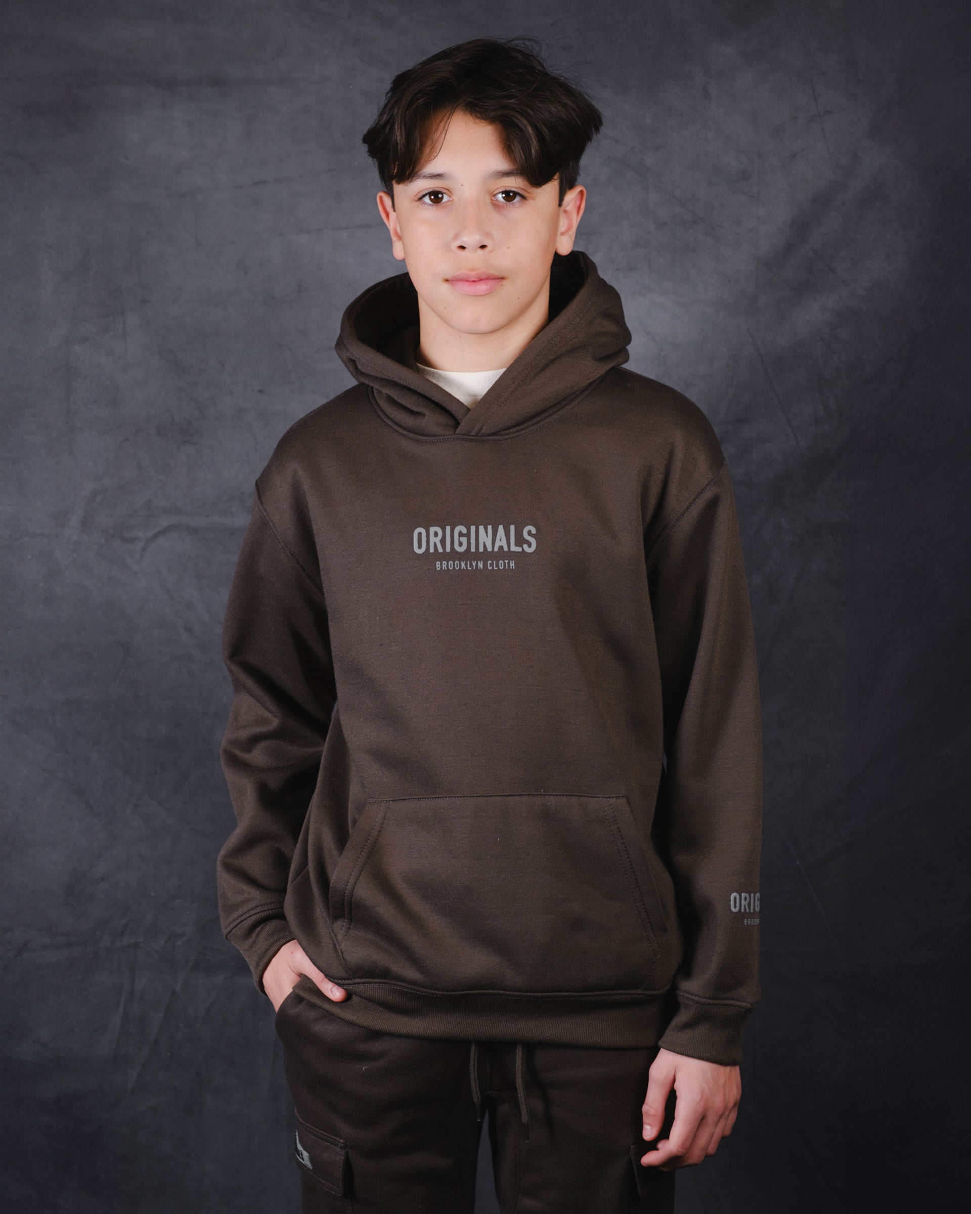 Kids Originals pullover hoodie with chest logo
#color_dusty-black