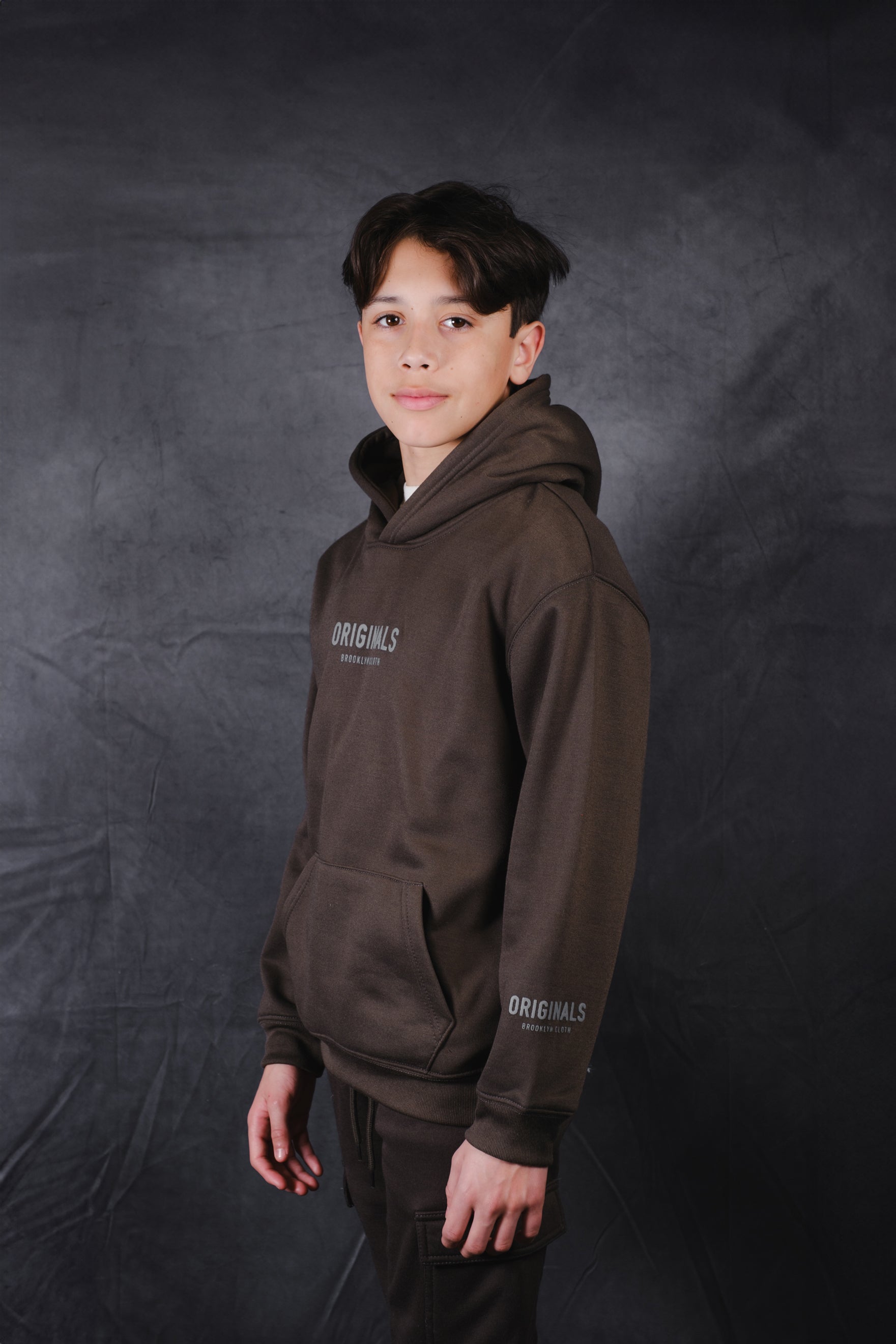 Pull over hoodie for kids with Originals logo on chest
#color_dusty black