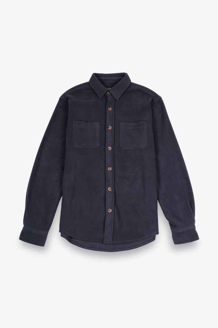Heavy knit shacket with button-up front and relaxed fit.
#color_navy