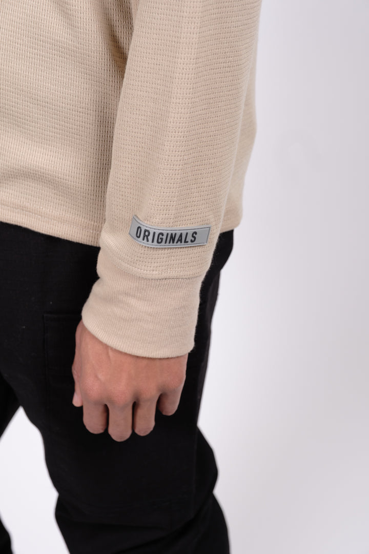 Original Rubber patch detailing on the sleeve #color_pumice-stone