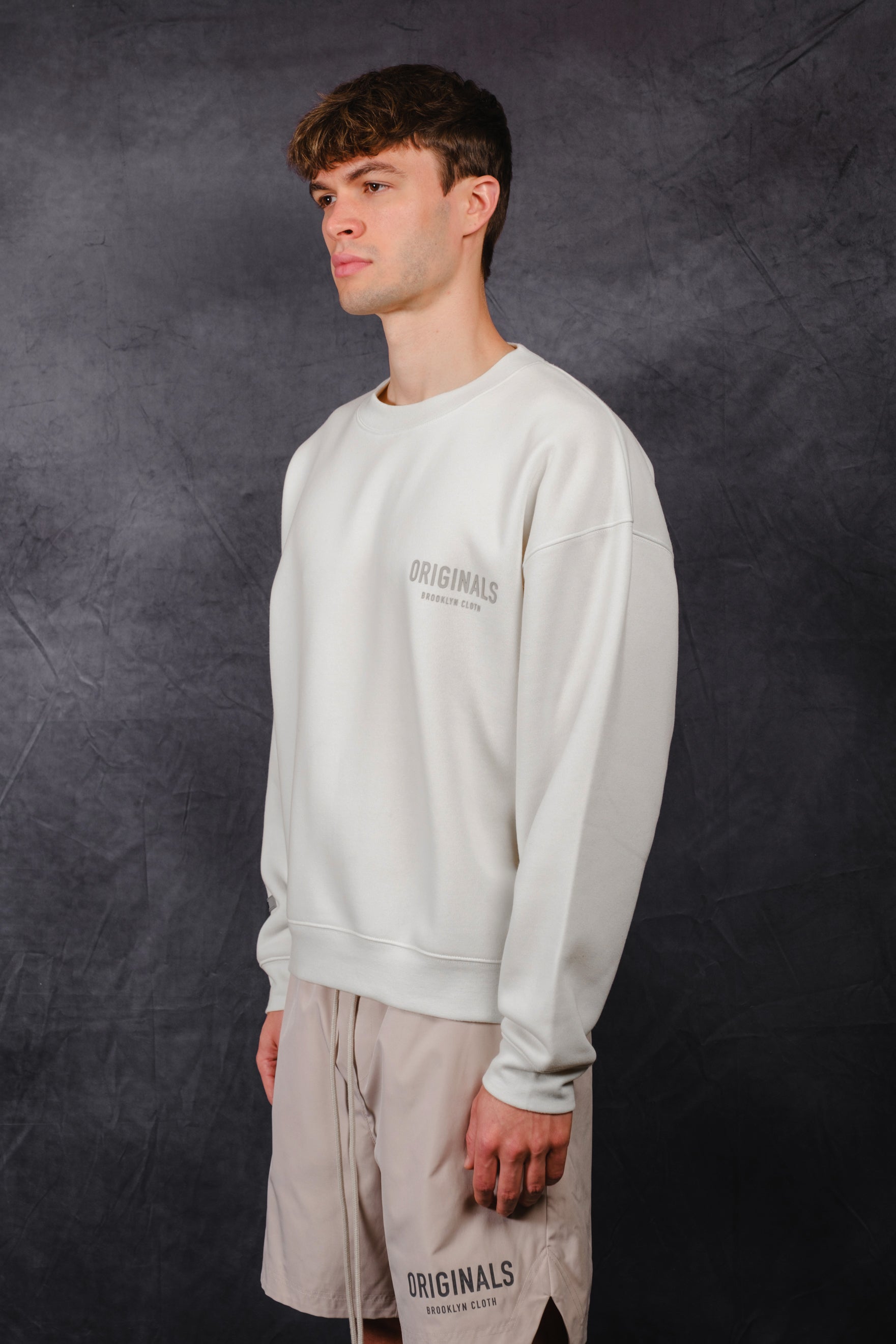 Relaxed fit Originals Tonal Hd Fleece Crew with ribbed details
#color_cream