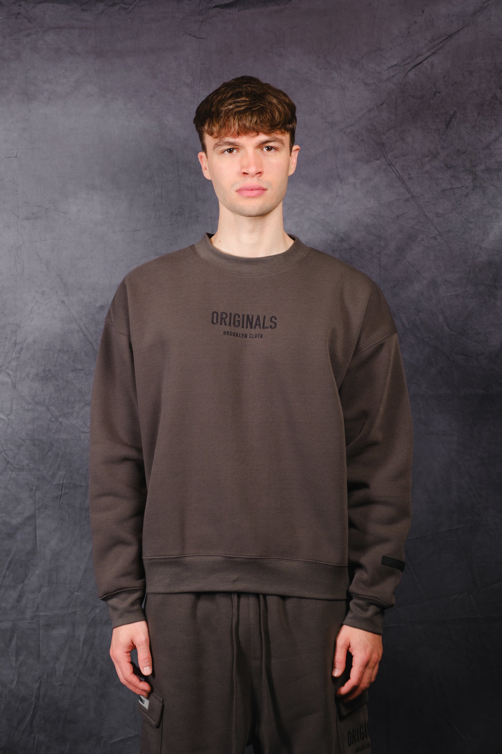Timeless tonal embroidered fleece crew neck by Brooklyn Cloth
#color_dusty-black