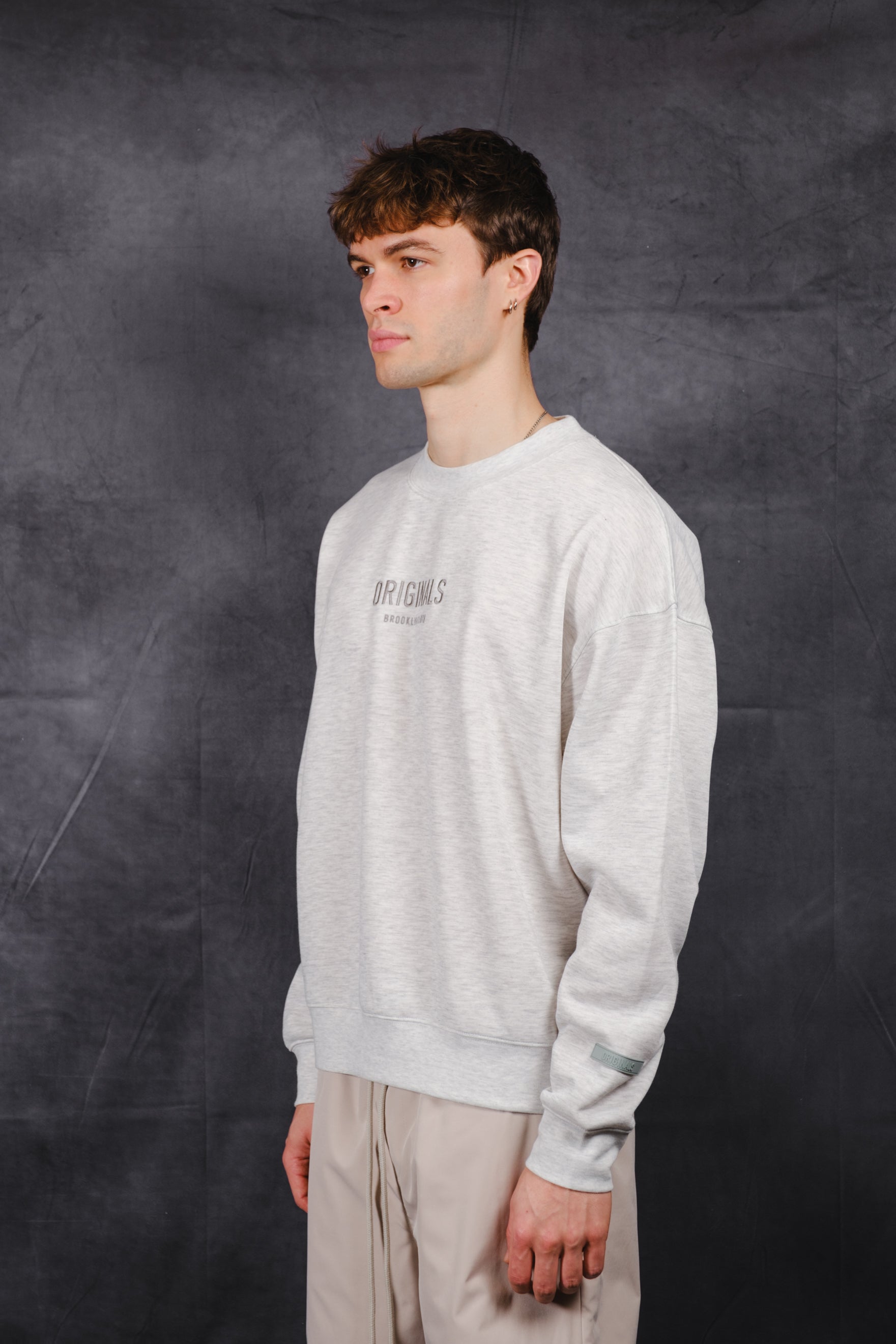 Elegant Originals Crew Neck Sweatshirt with tonal embroidery
#color_natural heather