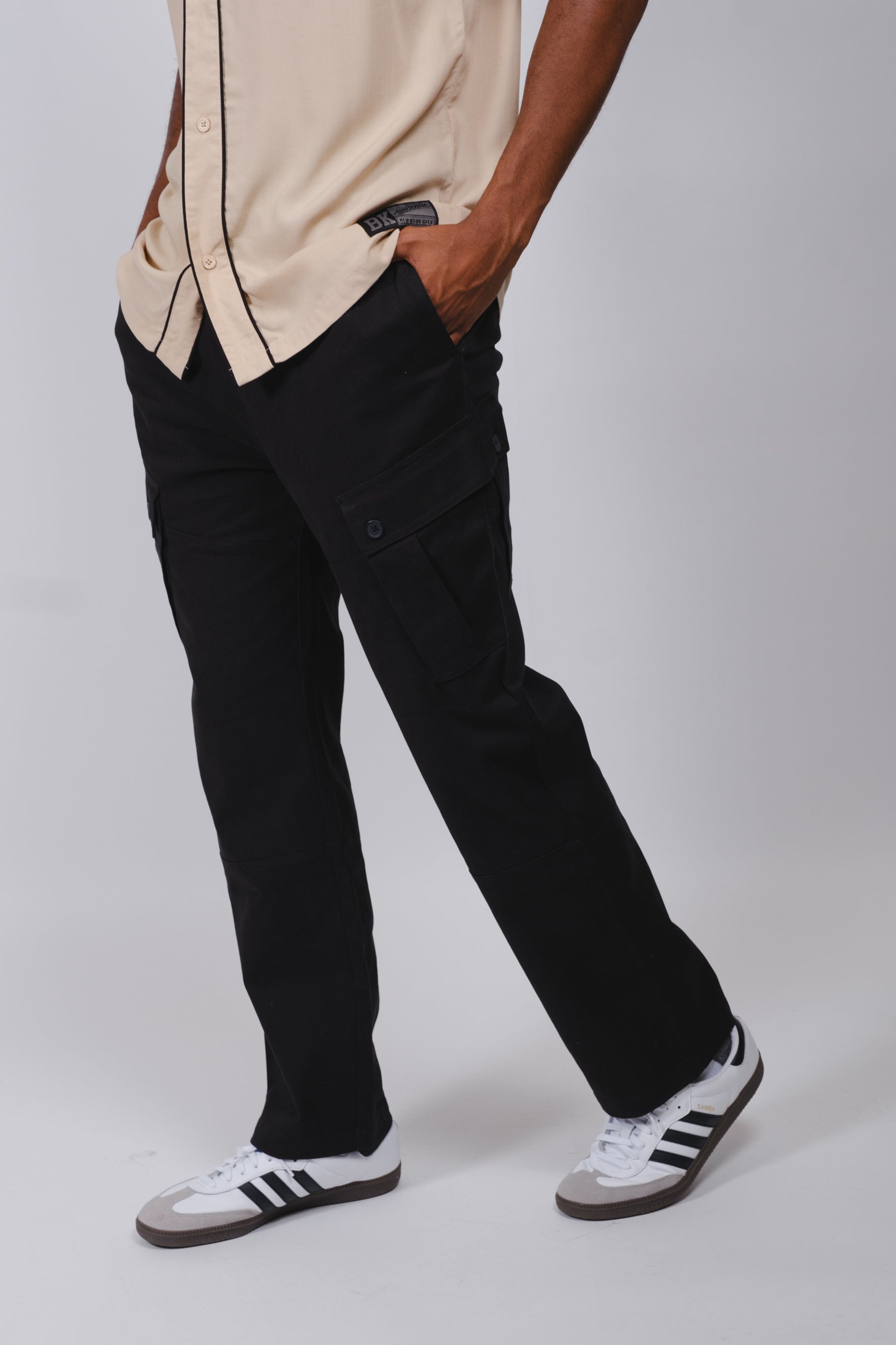 Durable twill cargo pants for men with military inspired design and multiple pockets
#color_black