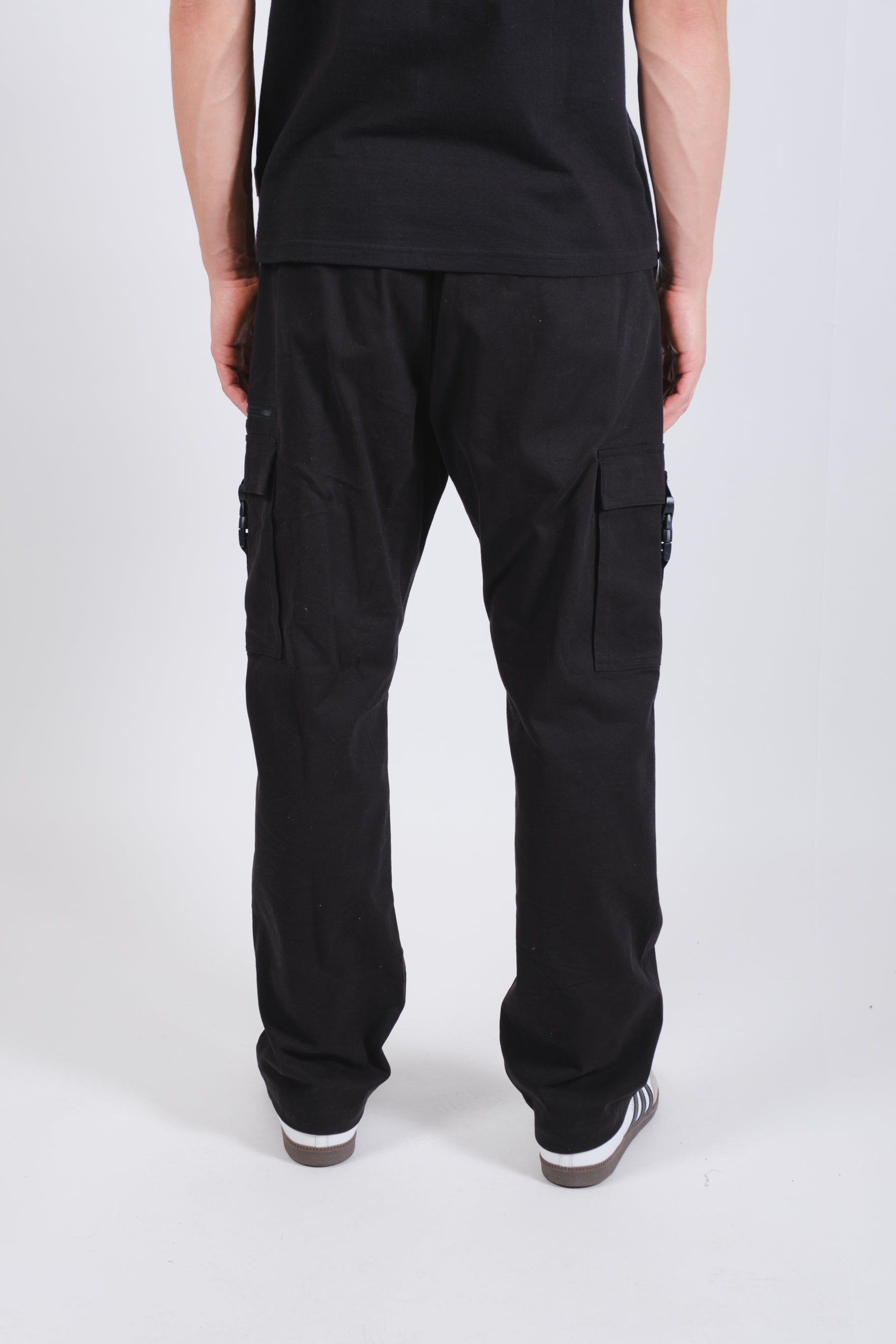 High quality men's twill cargo pant with zip buckle pocket feature in black #color_black