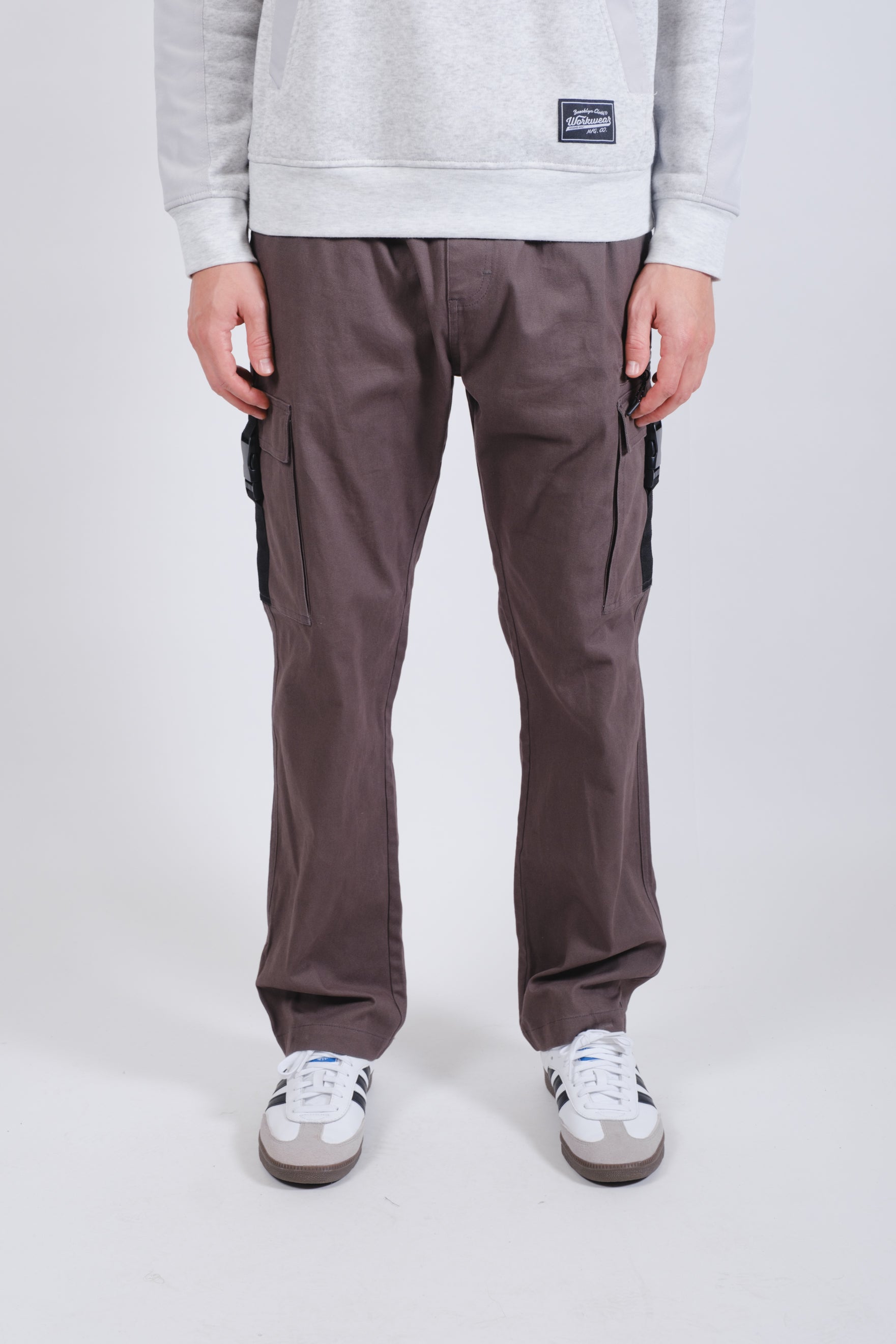Men's charcoal grey twill pants with cargo zip buckle pockets 
 #color_charcoal-grey