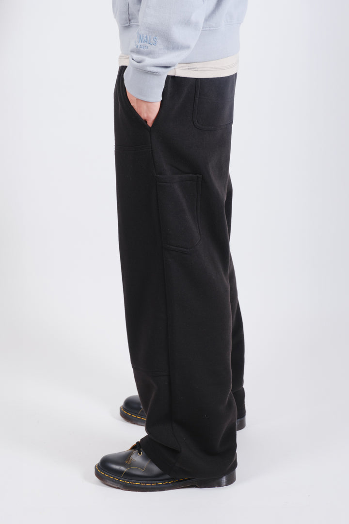 Men's fleece carpenter pants, combining comfort with versatile storage options
#color_black