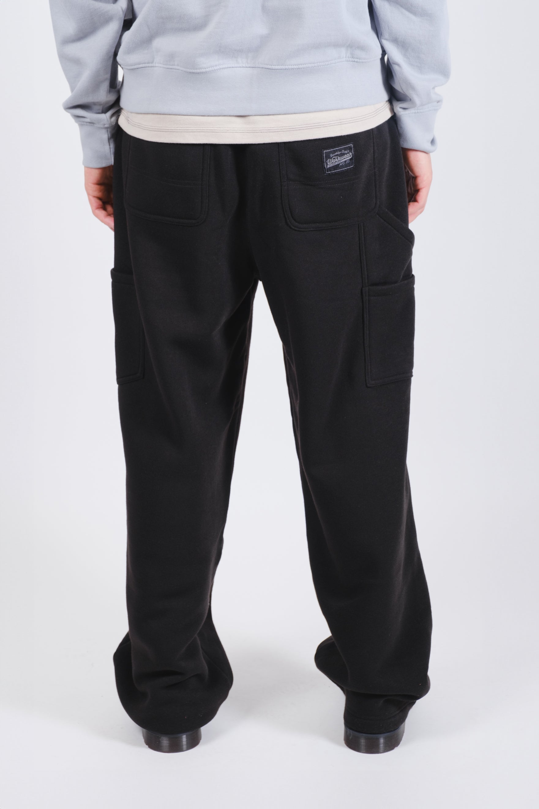 Stylish and functional fleece carpenter pants for men with durable poly fleece
#color_black
