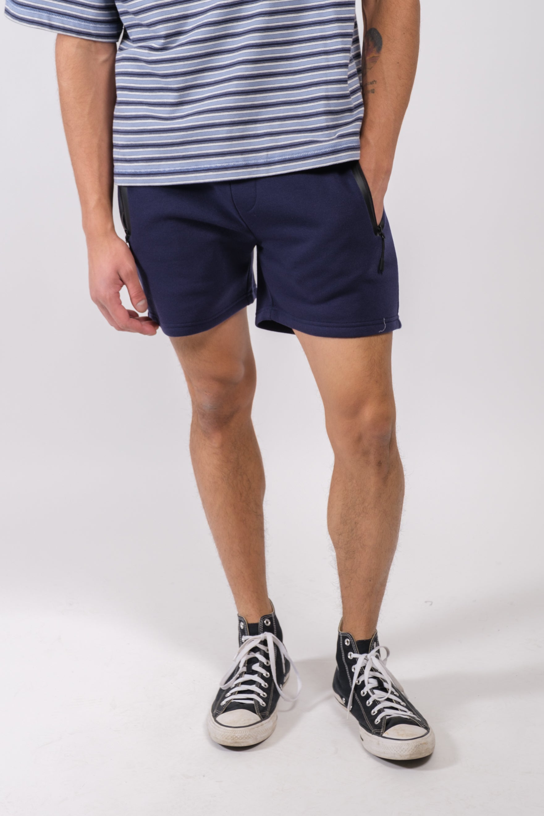 Sleek 5 inch inseam Heat Seal Zip Pocket Short in black by Brooklyn Cloth
#color_french navy