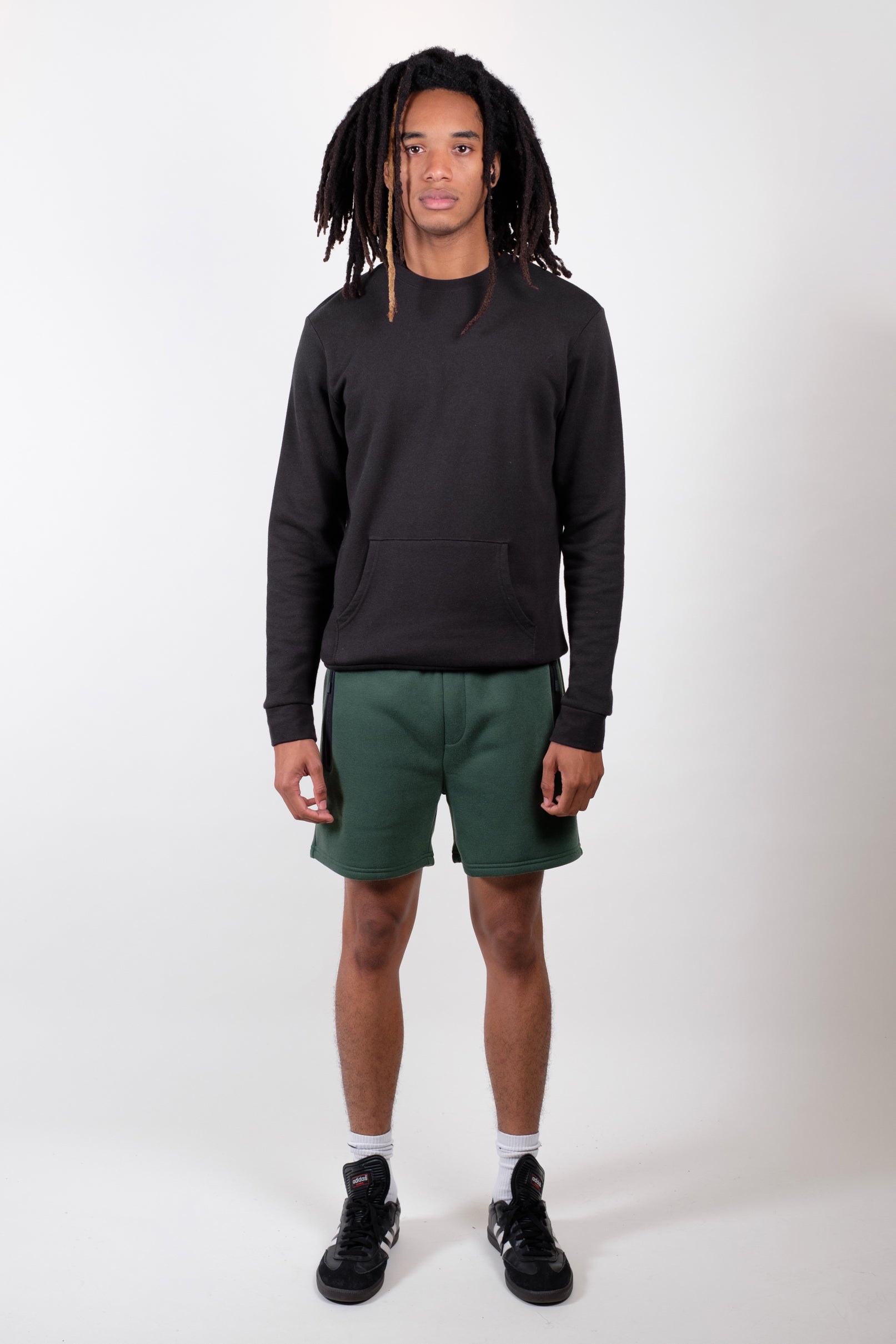 Men's 5 inch inseam shorts in black/white with zip pocket
#color_hunter green