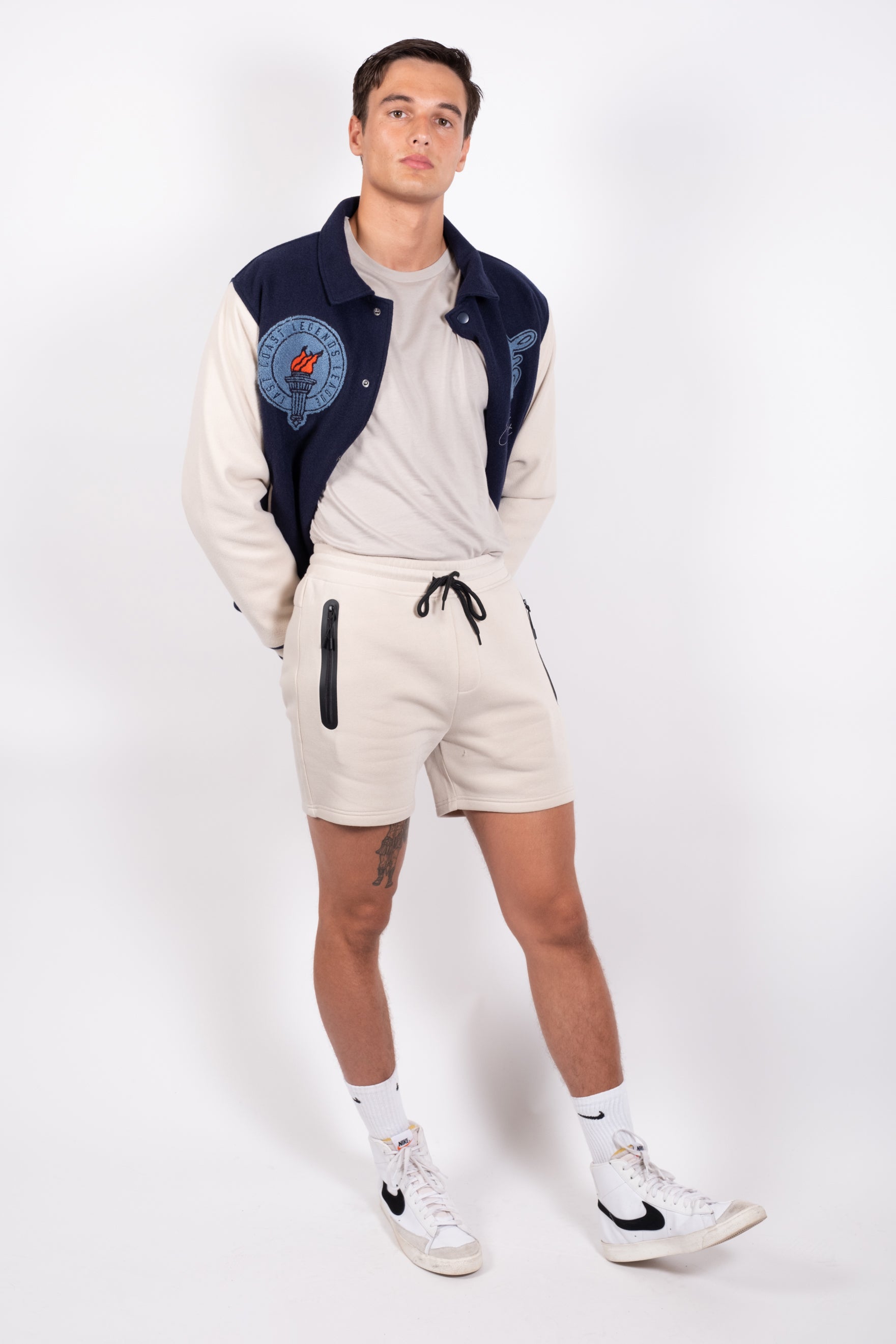 Men's Heat Seal Zip Pocket Short with a sleek design and 5 inch inseam
#color_sand