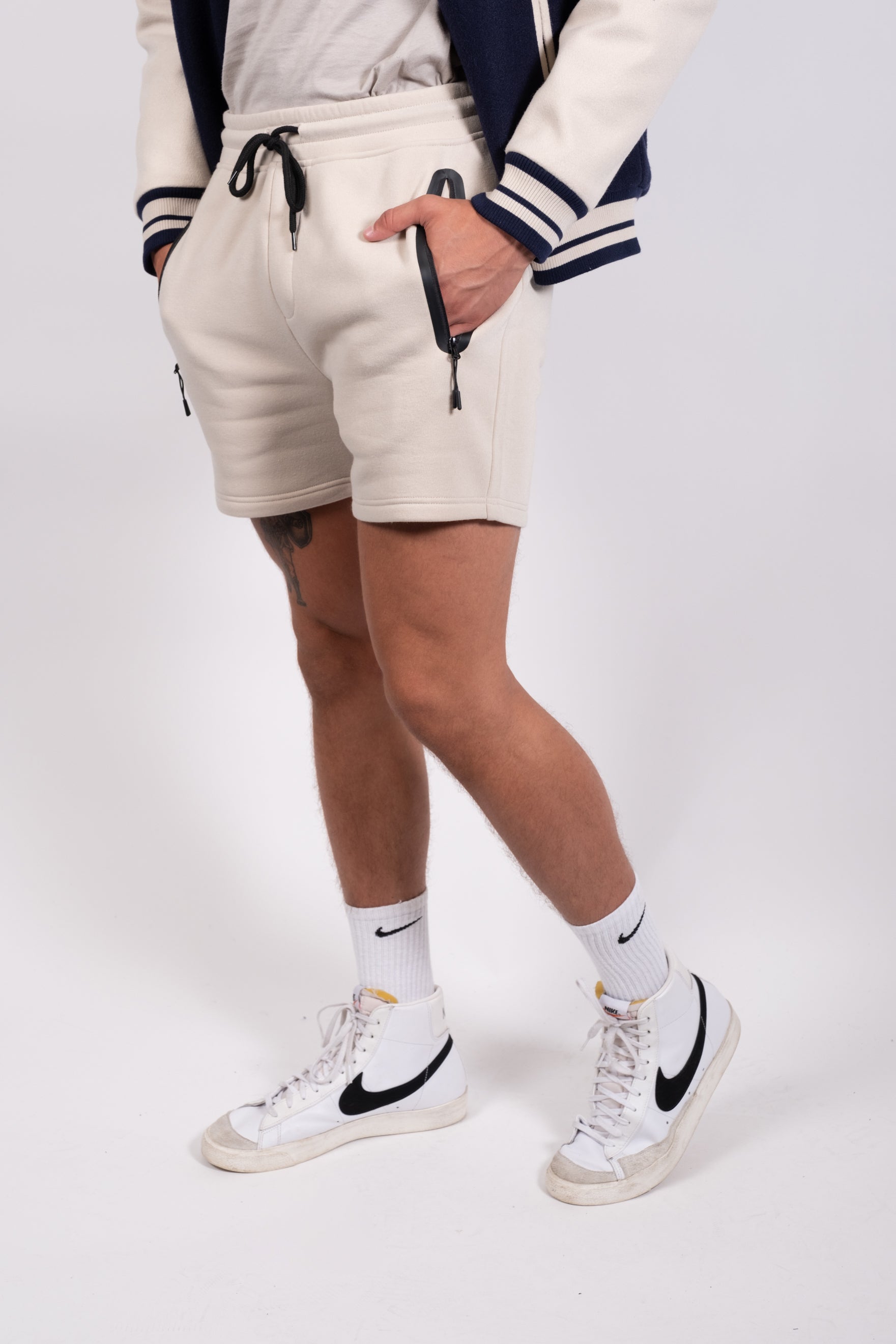 Brooklyn Cloth men's shorts with heat-sealed zip pocket and classic fit
#color_sand