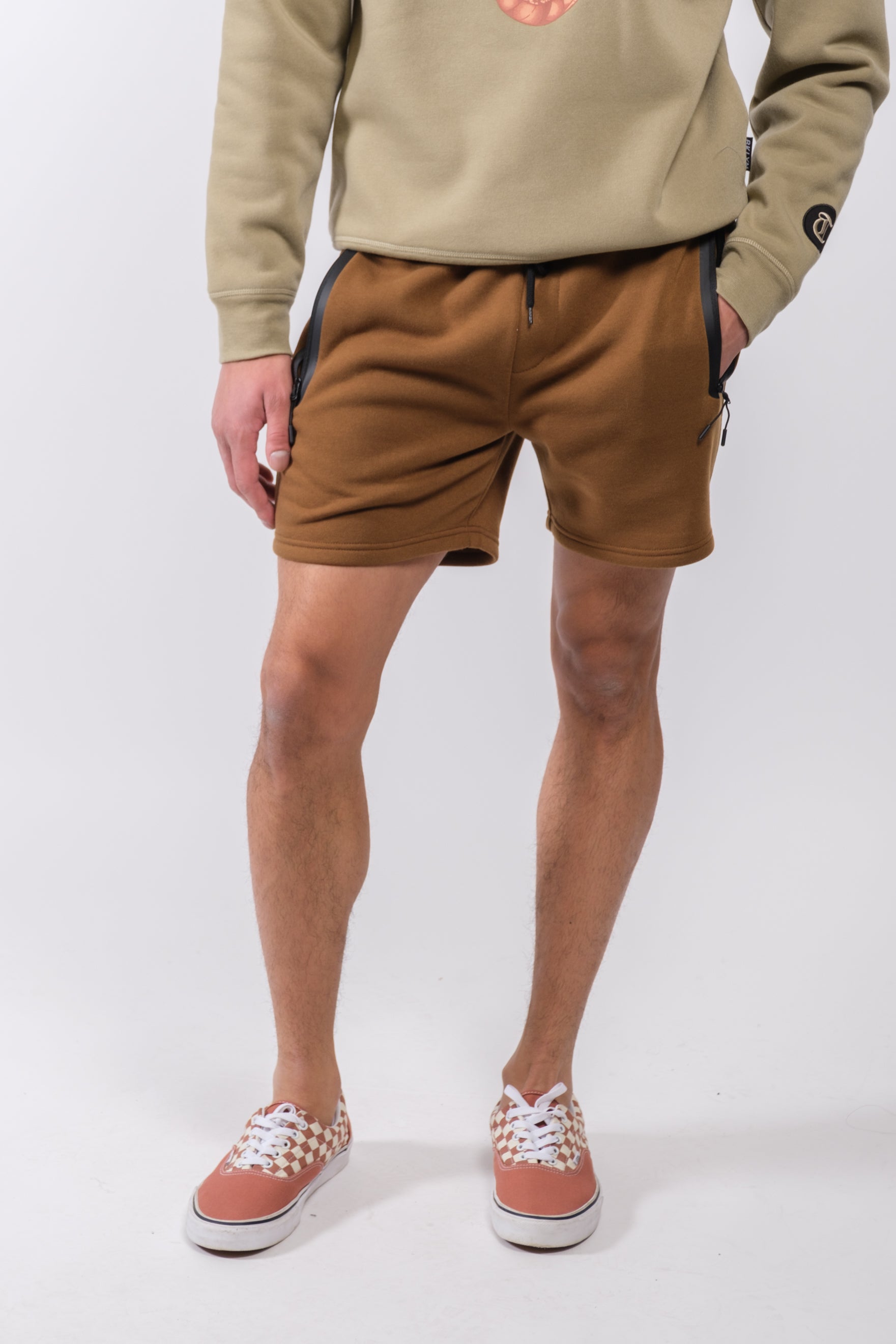 Men's polyester and spandex shorts with heat sealed zip pocket
#color_toffee
