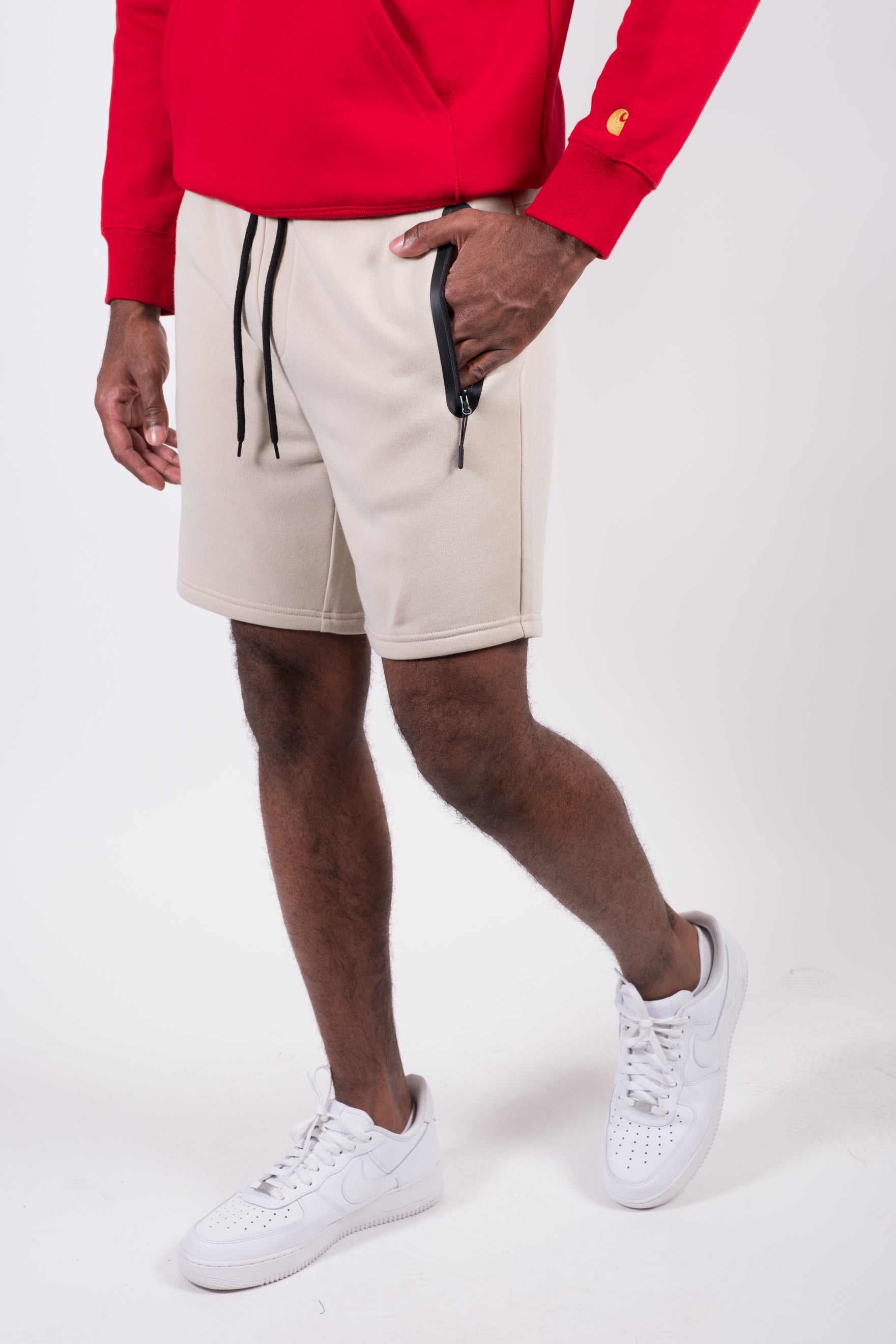 Adjustable fit men's Heat Seal Zip Shorts with elastic waistband
#color_sand