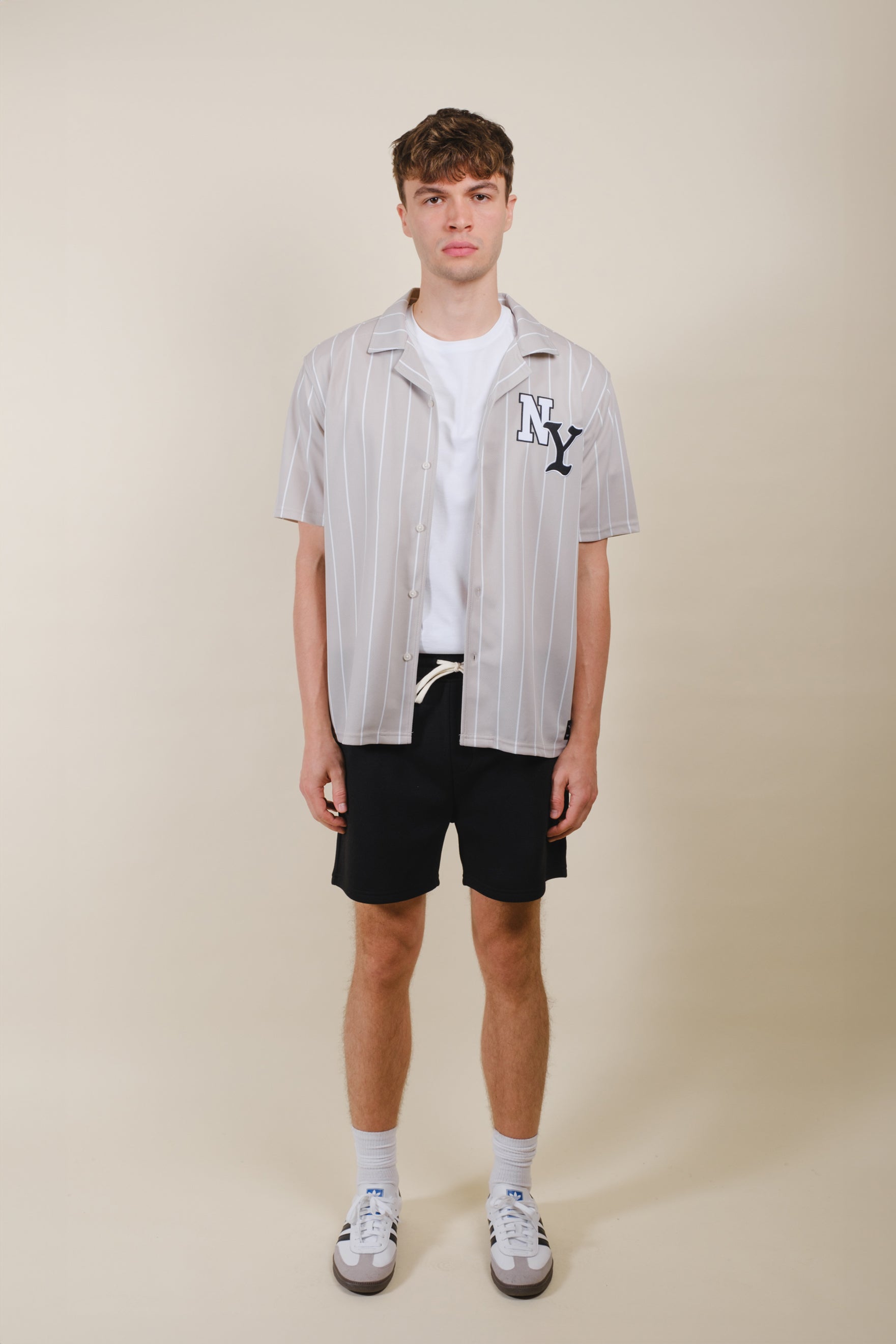 5 inch Core Fleece Shorts for men with relaxed fit and back pocket
#color_black