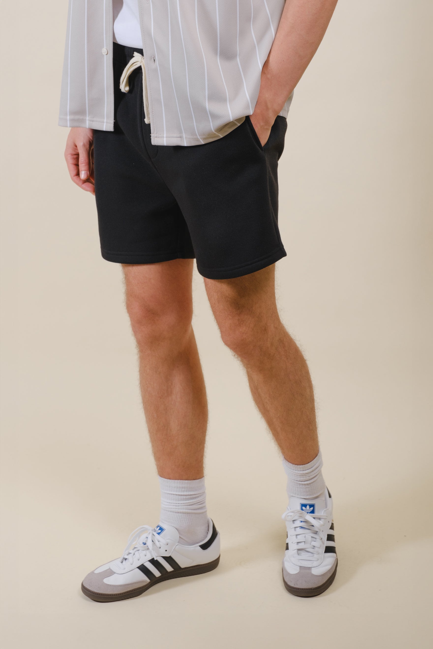 Comfortable 5-inch Core Fleece Shorts with elastic waist and back pocket
#color_black