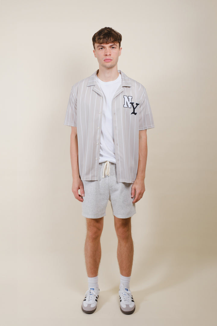 Men's soft fleece shorts with elastic waist and 5-inch inseam
#color_oatmeal-heather