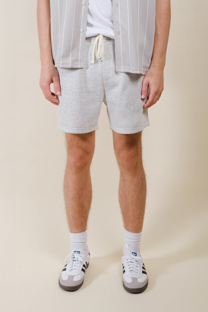 Soft fleece shorts with 5-inch inseam and elastic waistband for men
#color_oatmeal-heather