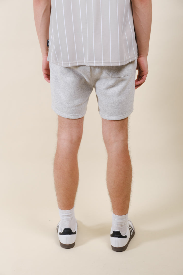 Casual men's fleece shorts featuring a comfortable 5-inch inseam
#color_oatmeal-heather