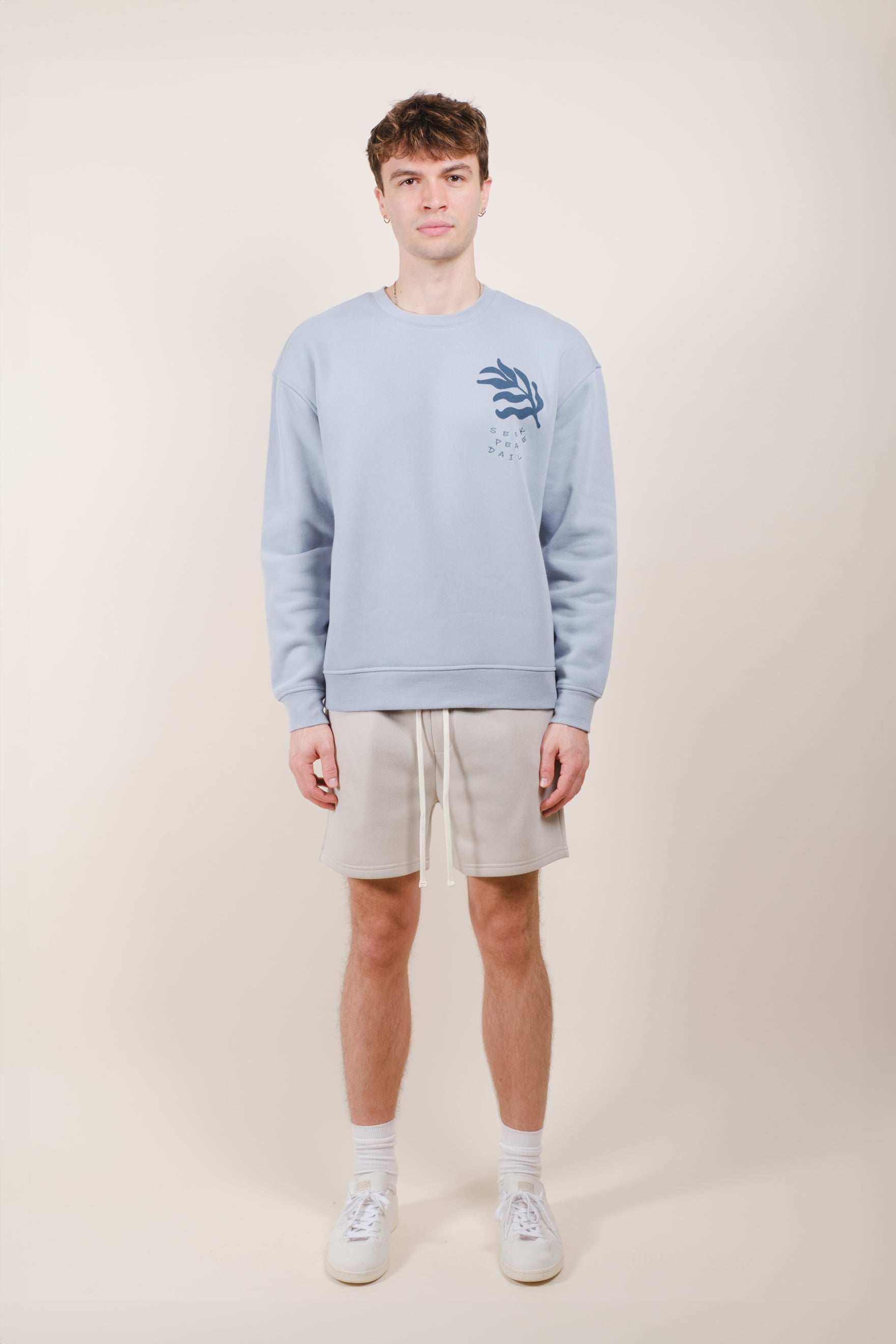 Stylish men's 5 inch Core Fleece Shorts designed for casual comfort
#color_sand