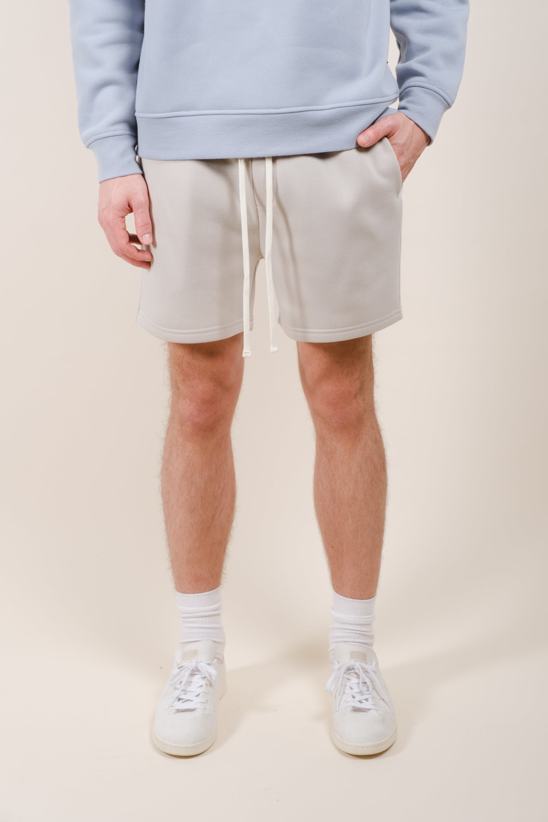 Men's casual fleece shorts featuring a 5 inch inseam and back pocket
#color_sand