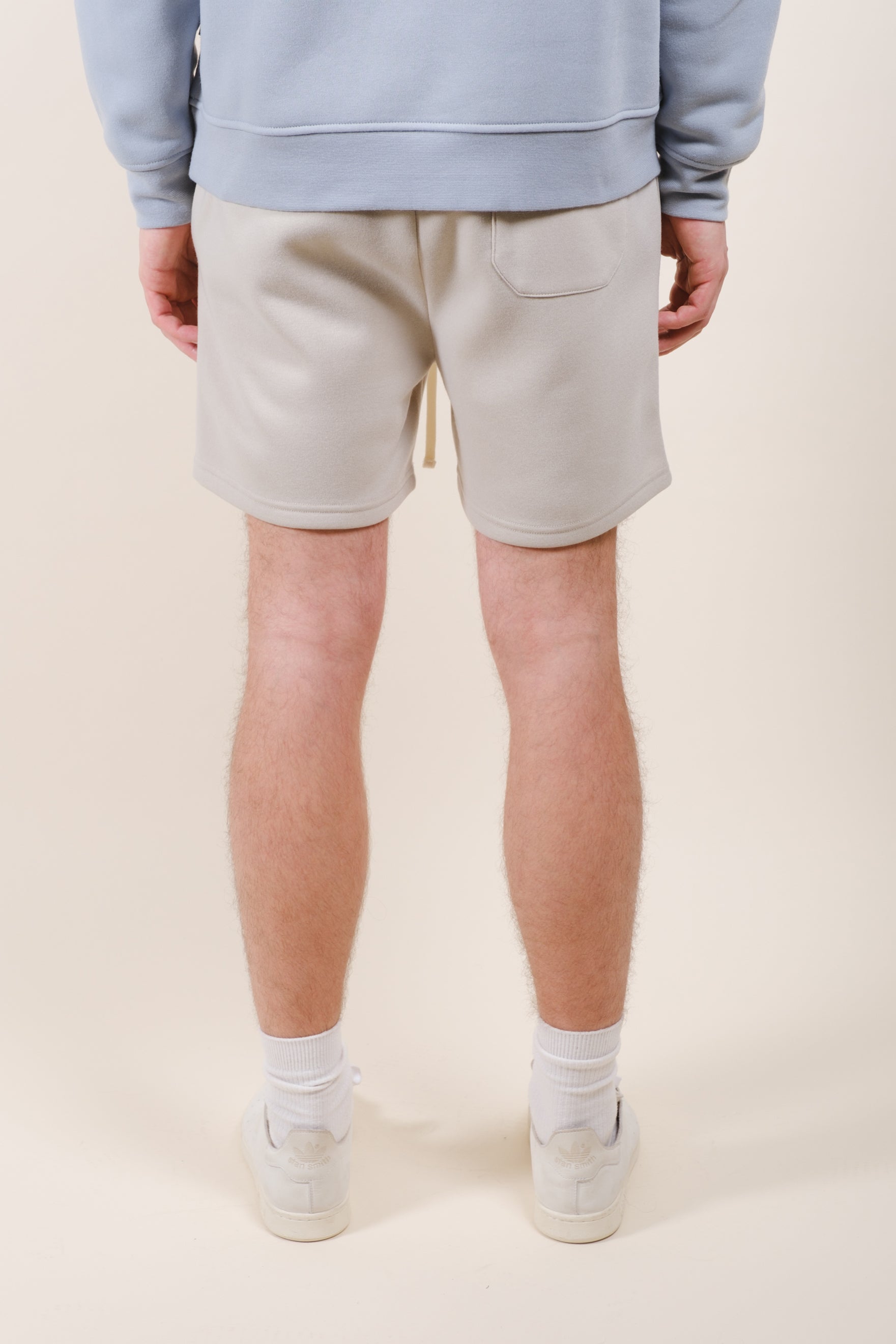 5 inch inseam fleece shorts for men with drawstring waist and back pocket
#color_sand