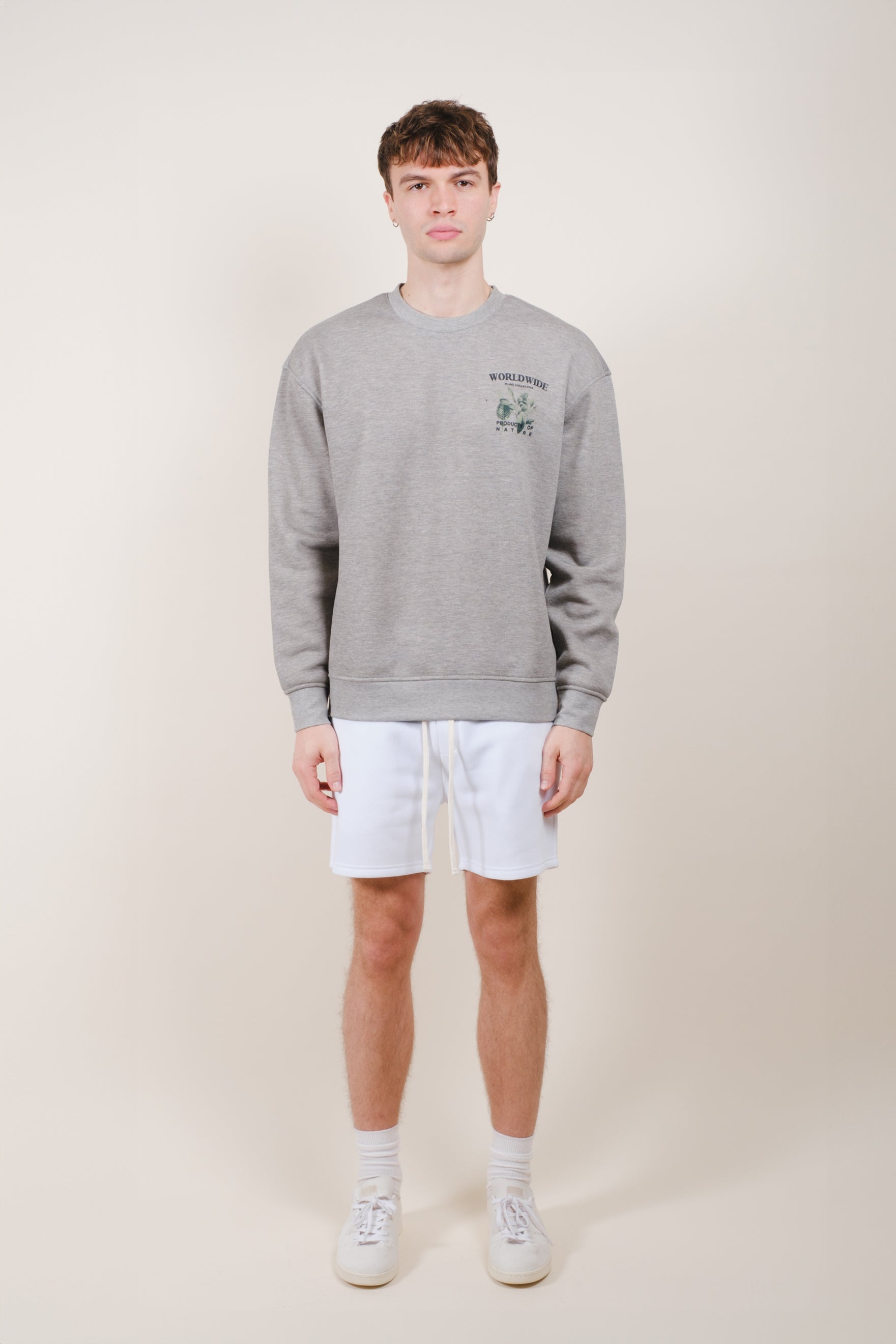 Comfortable men's fleece shorts featuring a 5 inch inseam and soft material
#color_white
