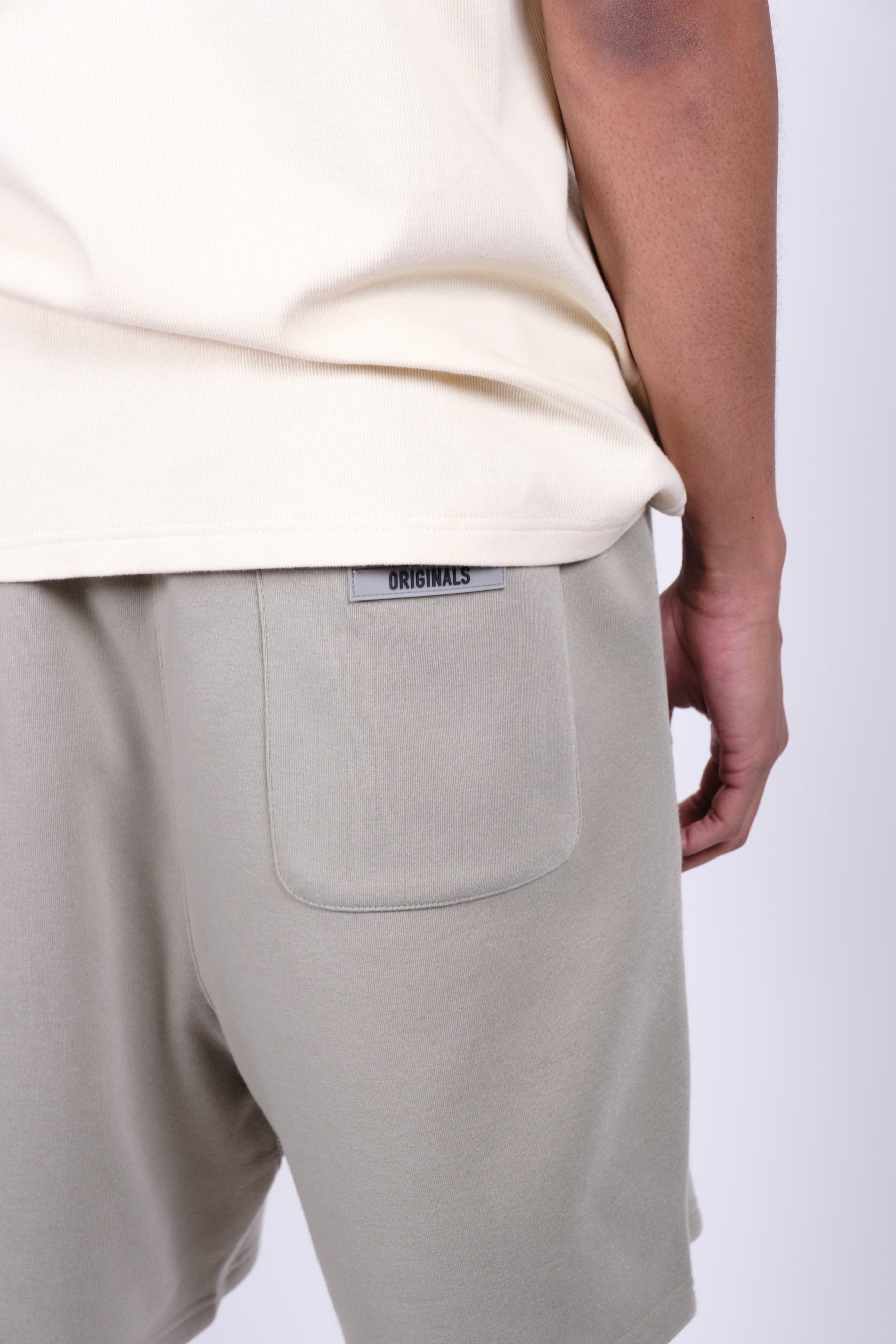 Originals print fleece shorts with elastic waist and pockets
#color_sage